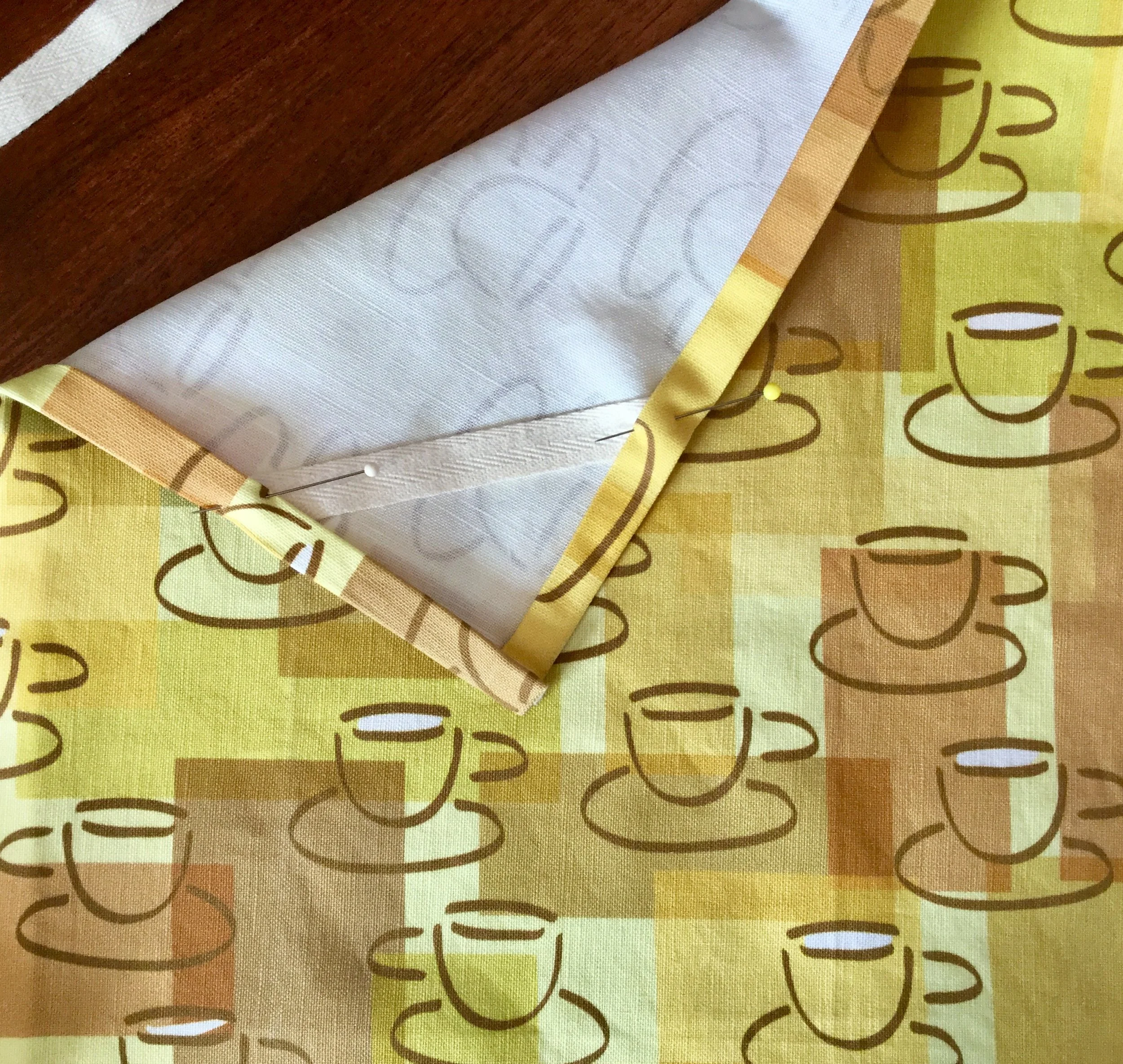 A tea towel made from “ Cuppa Cappuccino Joe ” fabric.