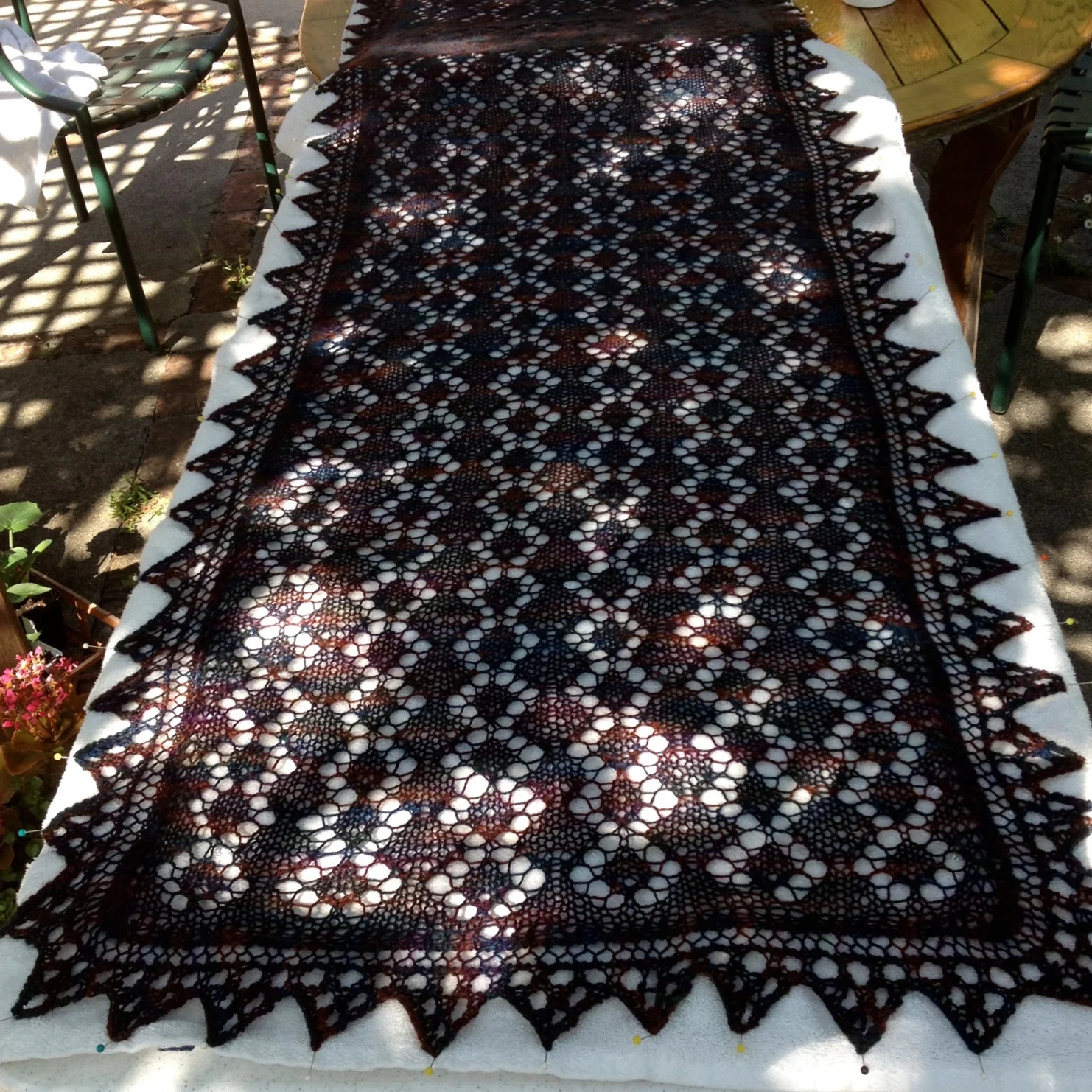 A Lace shawl I knit &laid out in the fresh air for blocking. The pattern was from the book ‘Victorian Lace Today’ by Jane Sowerby.