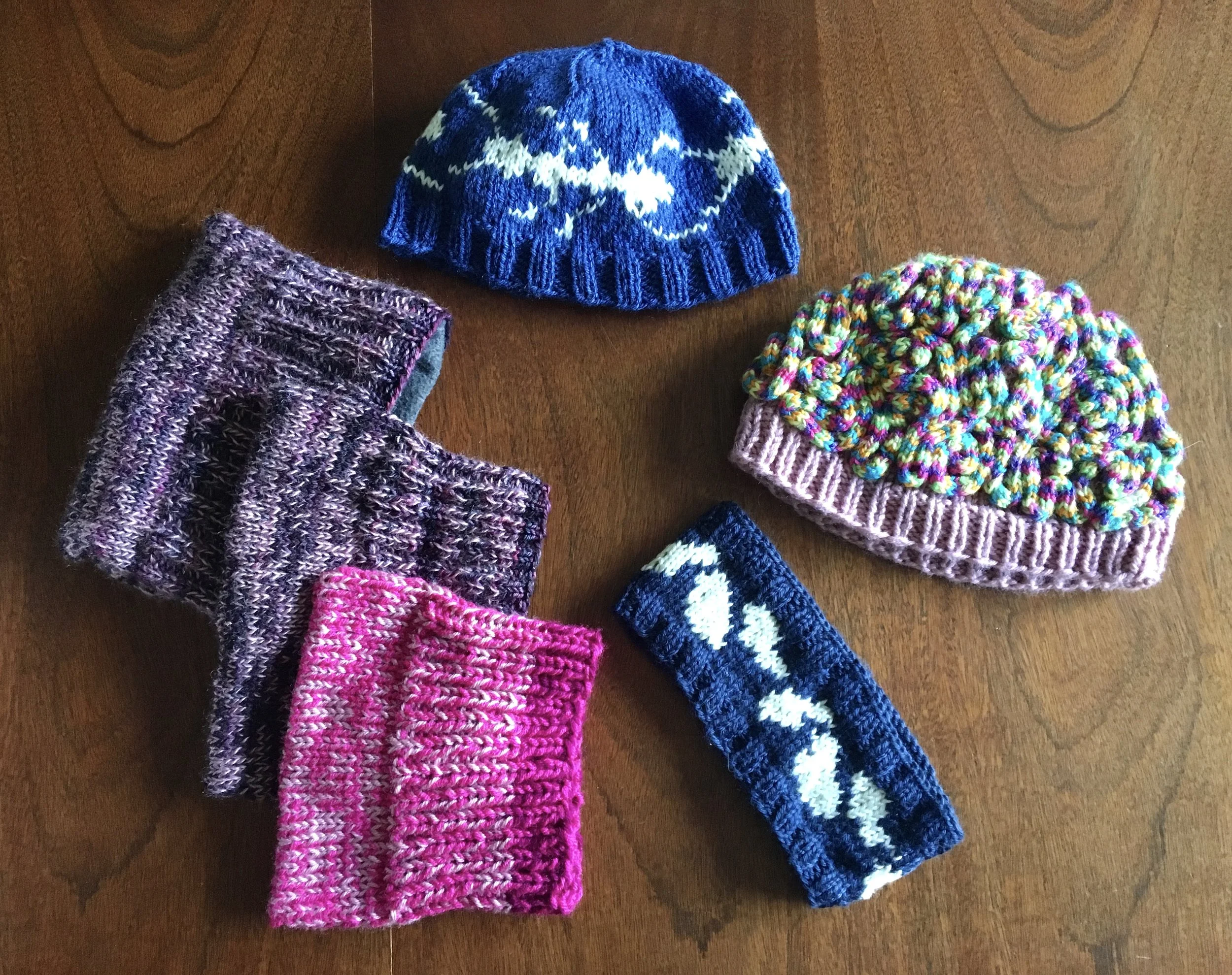 Science hats that I made / designed (ant and yeast band) and pussy hats.