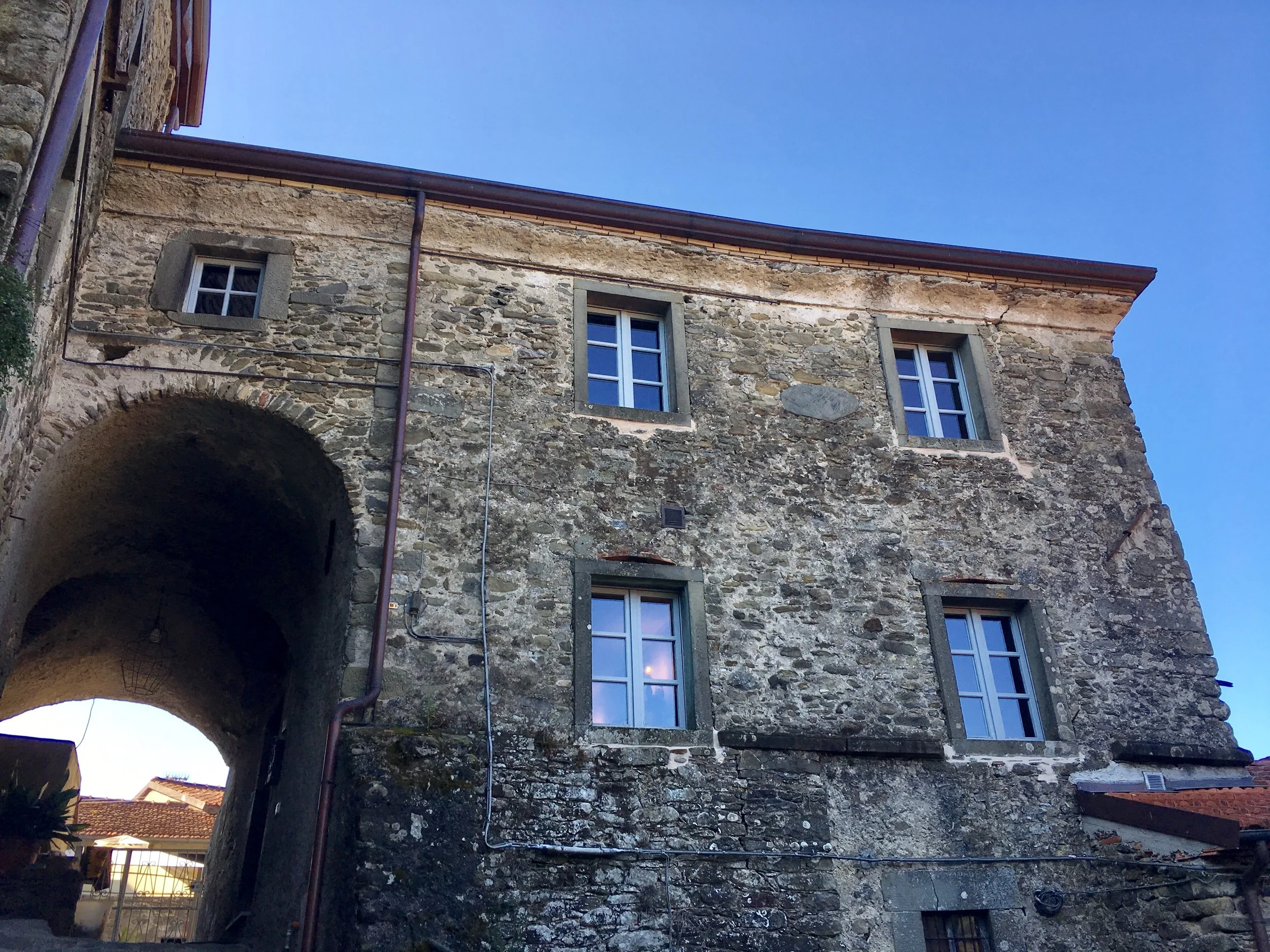 View from the ramp below La Casetta al Ponte built in the 1700’s in the Medici-style of Tuscan architecture in the Lunigiana.