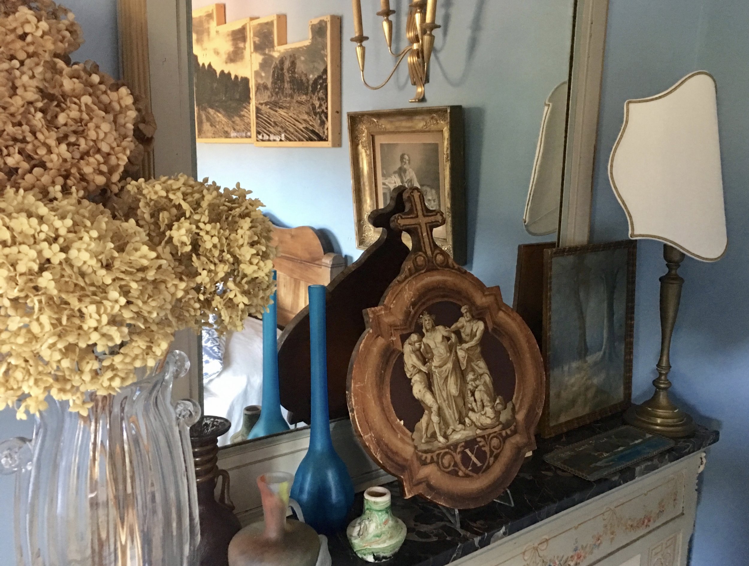 Objects on the mantelpiece in the Master BR.