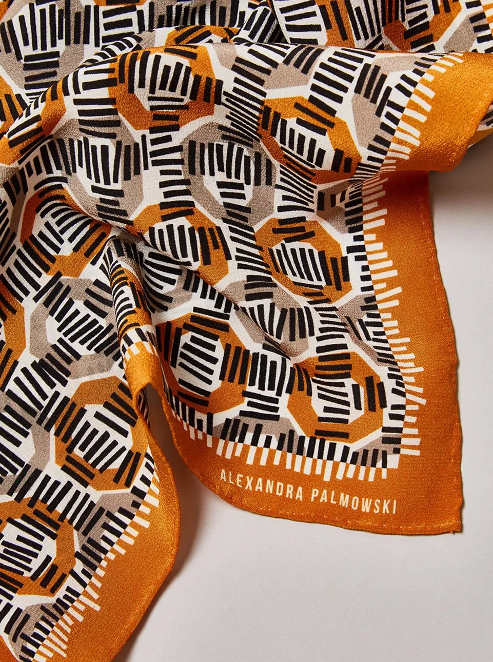 ap_circle_grid_scarf_orange_close_up_2.jpg