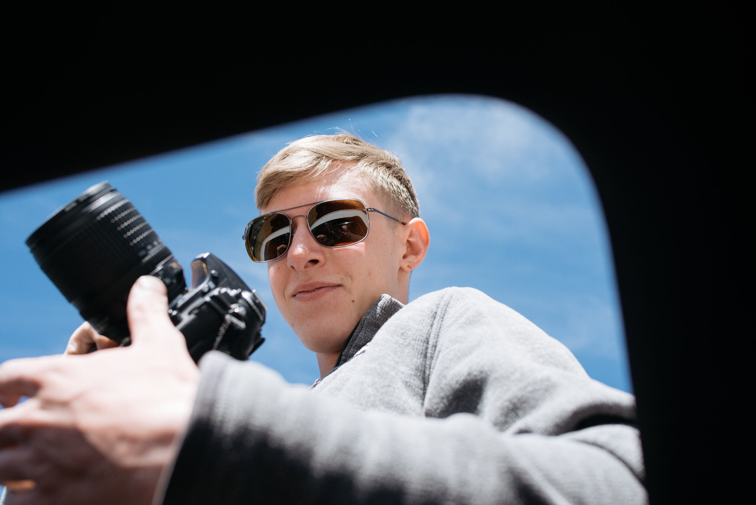 Alex taking photos out of the sunroof, me just outside my window!