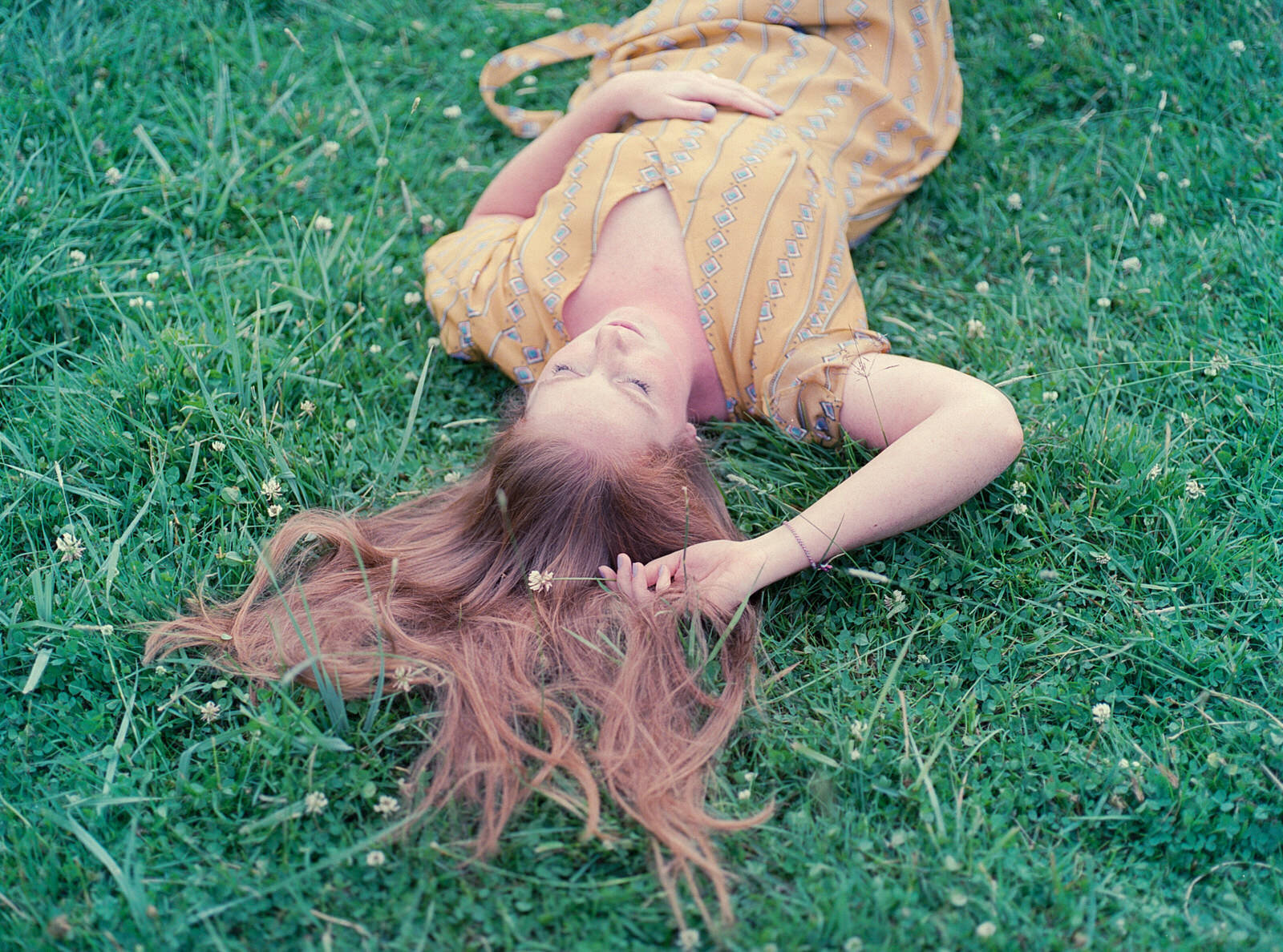 Her hair and that green grass were a perfect combination!