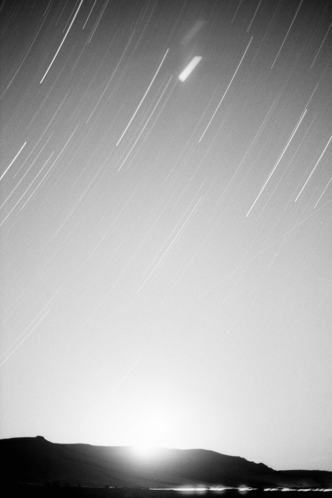 one of my 4 images I took that night. Moon rise and star trails. Olympus OM1