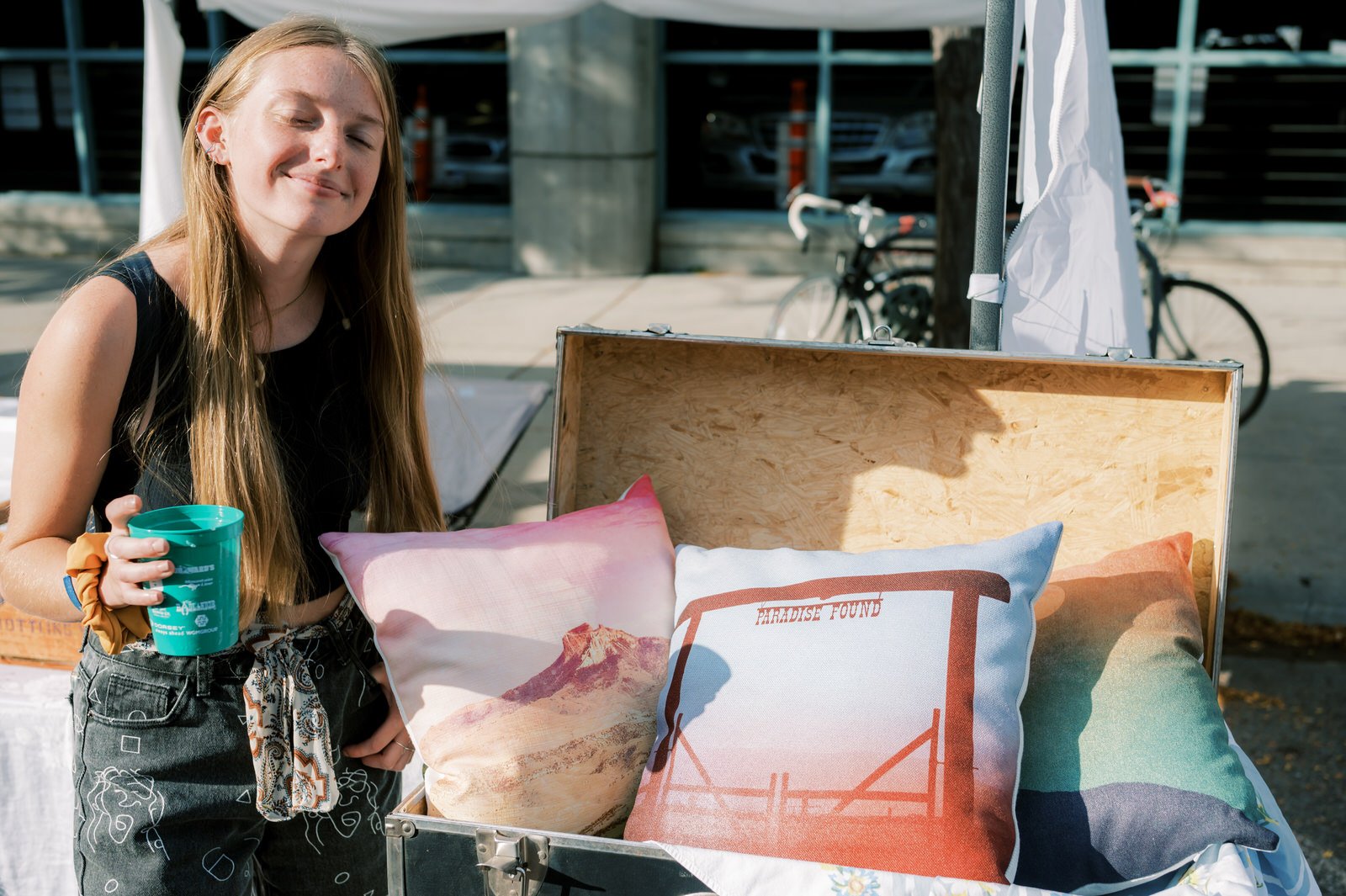 The art fair...turns out Hannah sewed these pillows for this photographer!!  I bought some prints!!