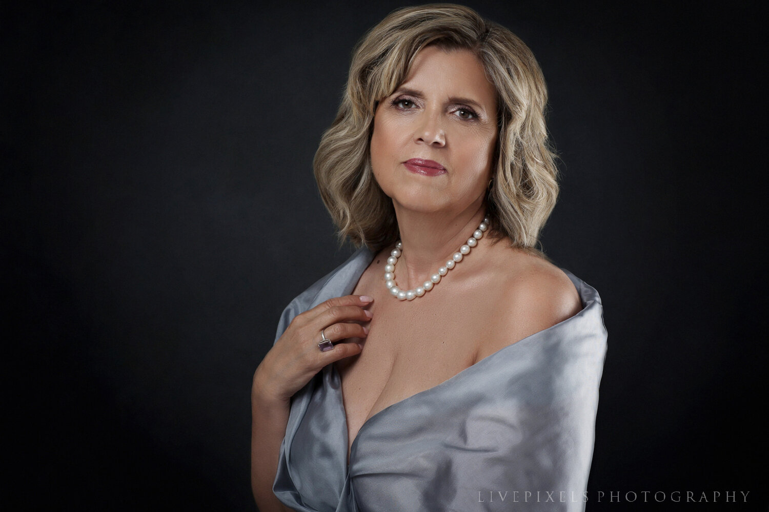 portrait of a woman with pearl necklace.jpg