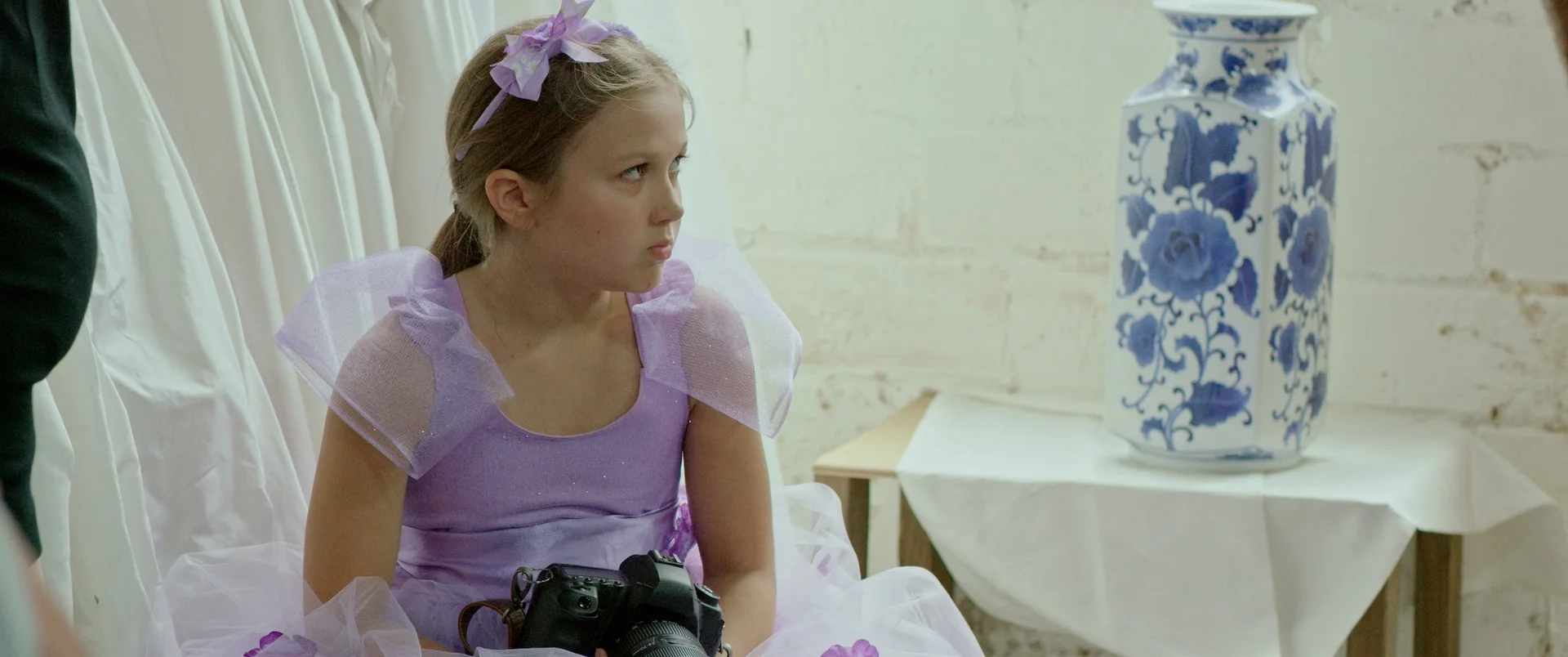 ZOE SCOWLS IN FLOWER GIRL DRESS.jpg