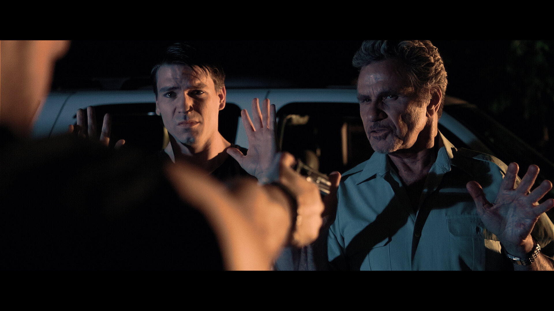 10. Martin kove (Sheriff Jack Miller)& Jesse Kove (Officer Trent Miller)_1.jpg