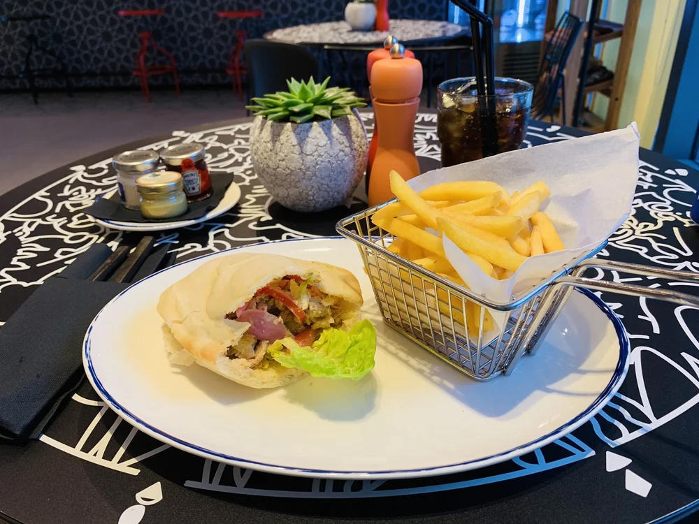 Lunch at MishMash: Chicken pita, fries, and a cola of some kind.