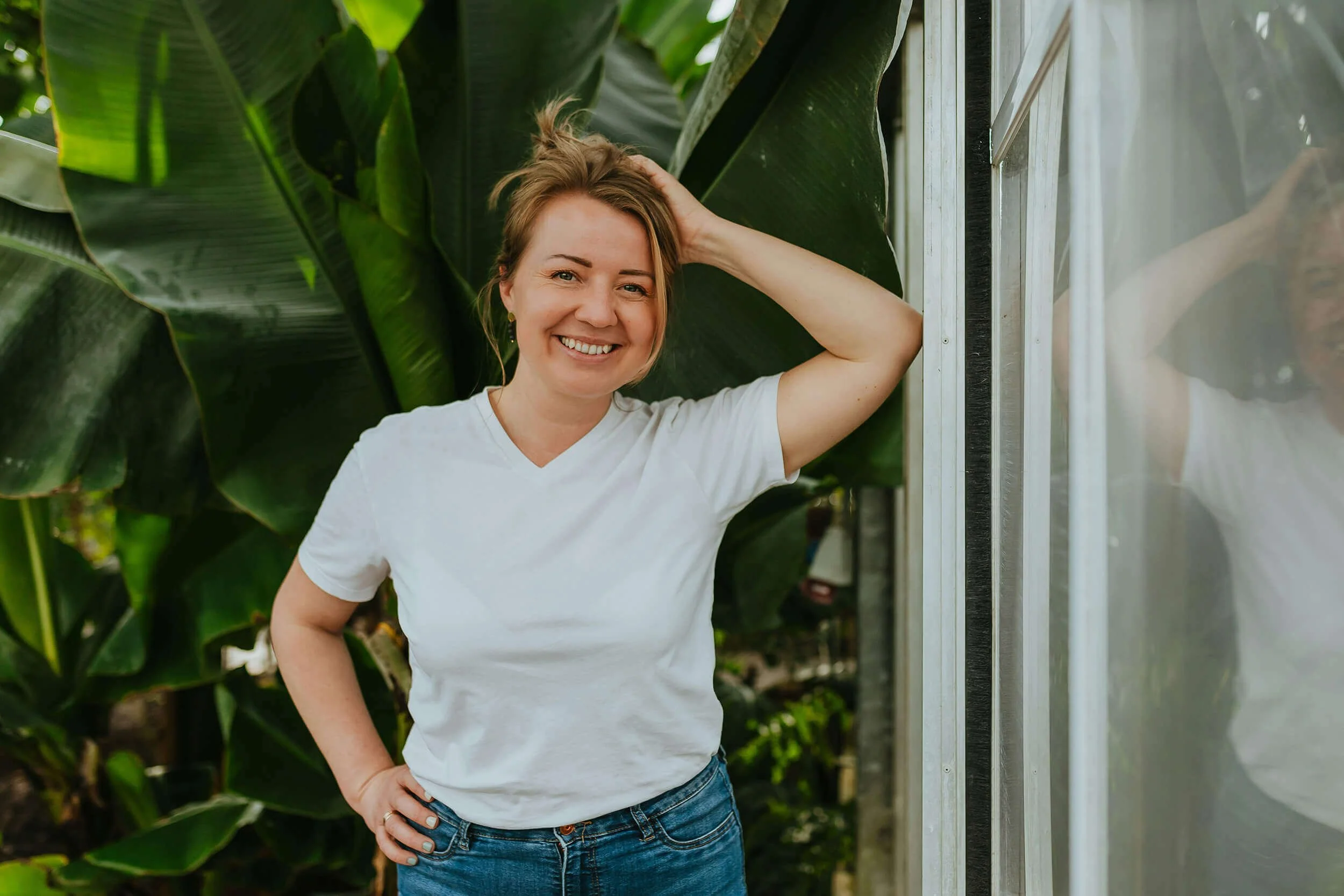 Woman standing outside and smiling after concierge naturopathic medicine appointment for perimenopause