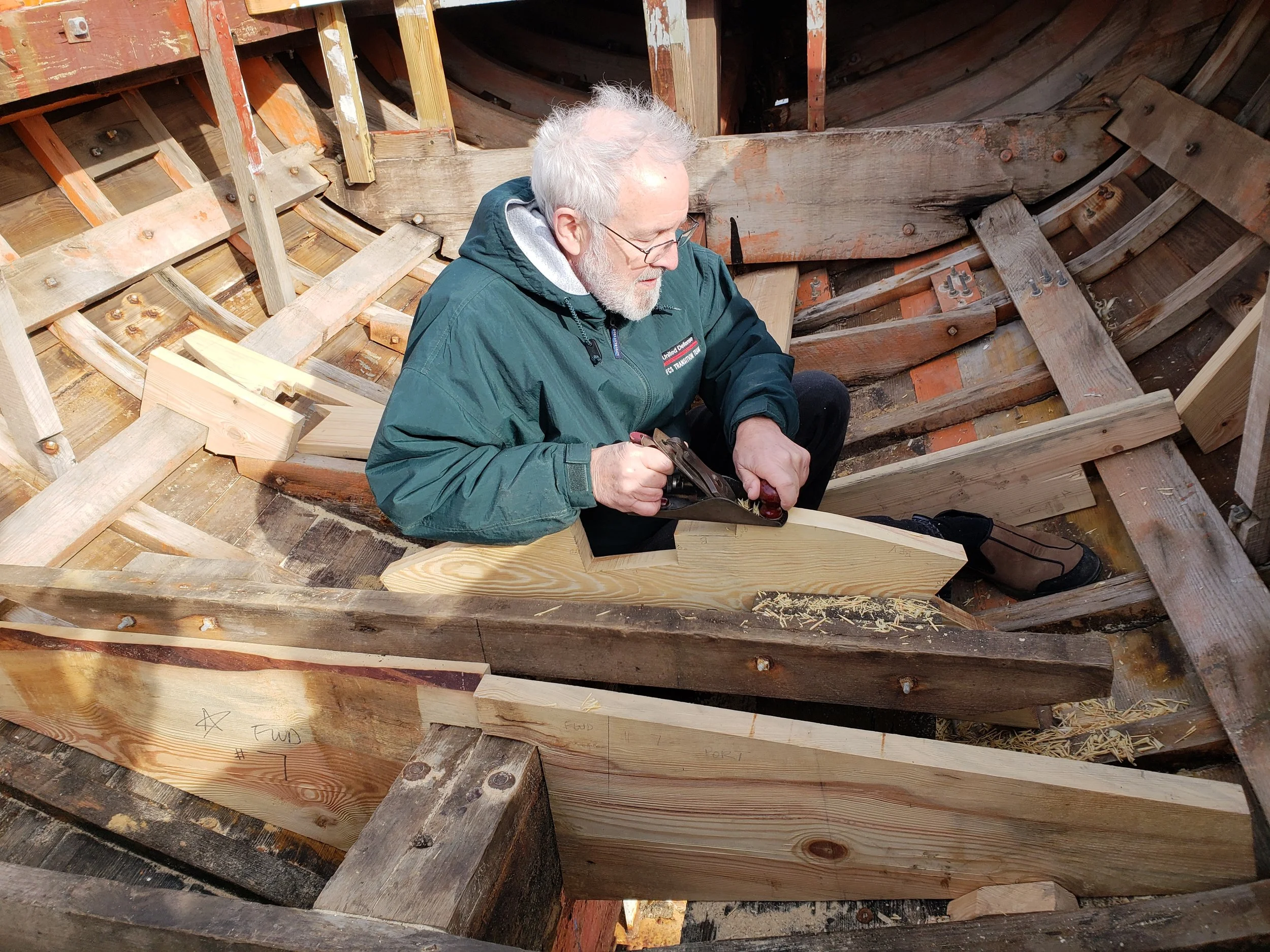 George is fine tuning the bevel on station # 7 where it contacts the hull.