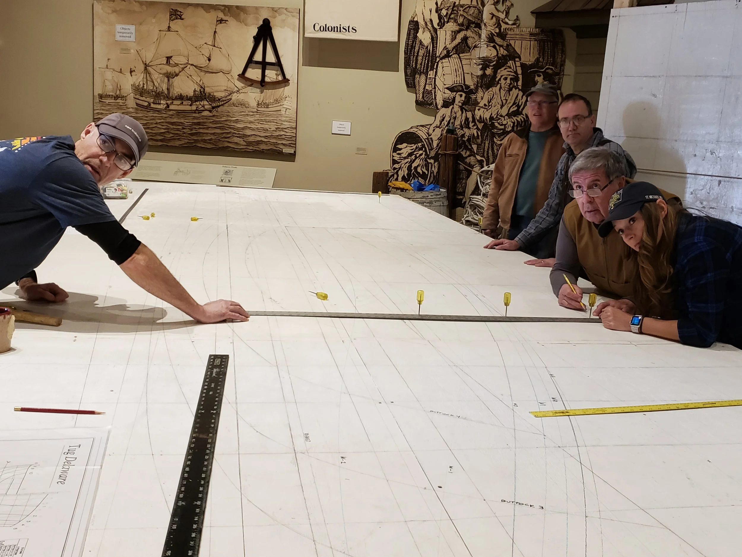 Participants laid out the station lines full scale starting mid-ship with Station 5. Due to the fore mentioned space constraints, we focused on the aft portion of the keel where more information is needed for constructing our new keel. Over the years cheek and filler blocks have been added to the width and height where the prop shaft and rudder shafts pass through the keel in an attempt to strengthen and support these lightly built areas.