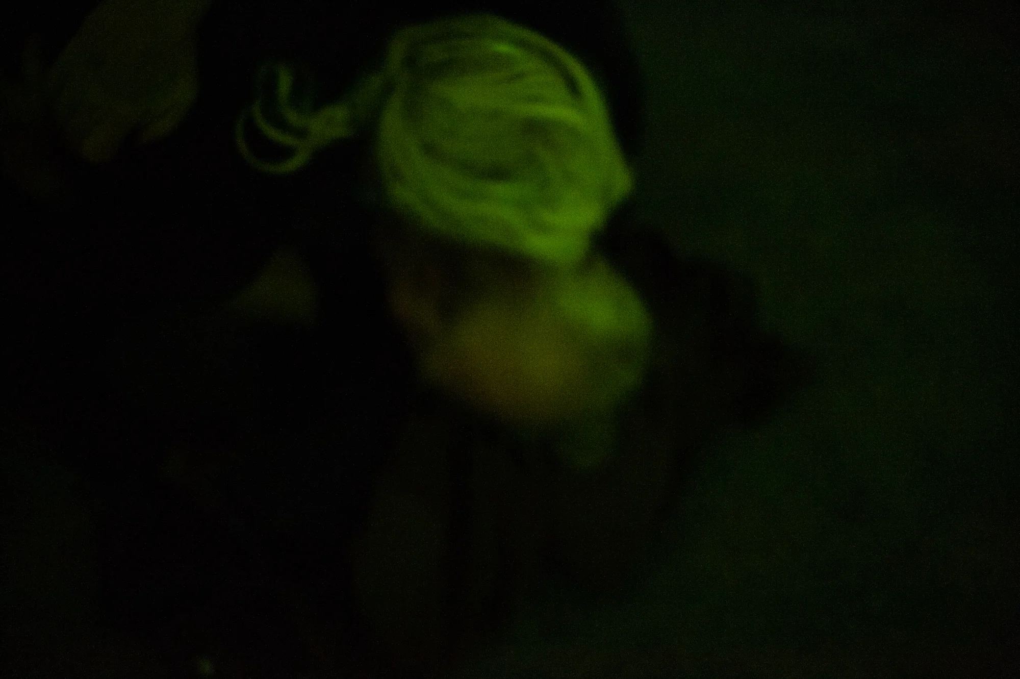 Jeanie and Will embrace on the floor of his studio apartment at night.