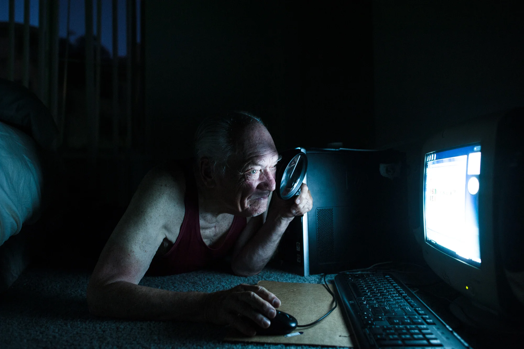 Passionate about solitaire, Will searches for the game on his computer at night.