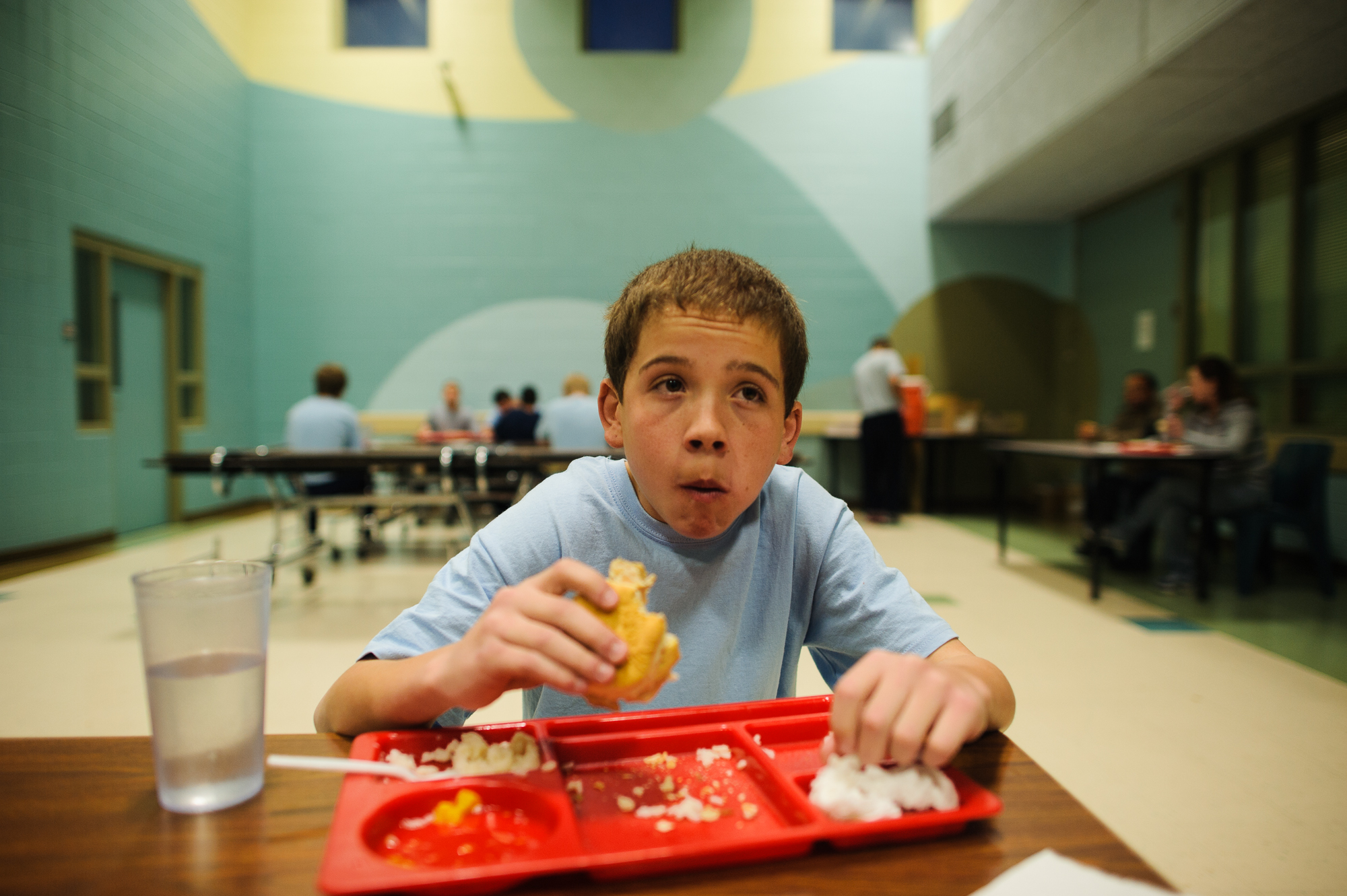  Vinny, age 13, eats his first meal in the detention center cafeteria, 2012. 
