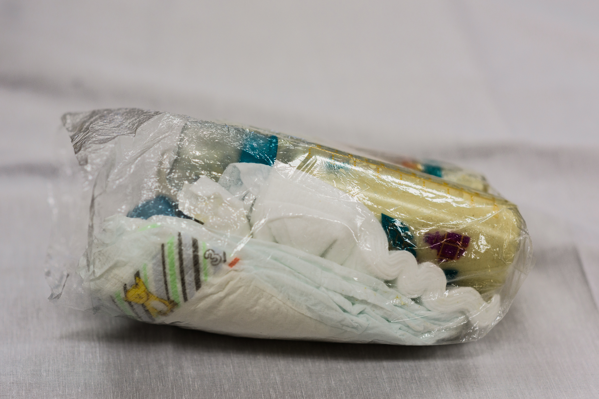  A plastic bag carrying diapers and a baby bottle sits on a table in the visitation room at the Okeechobee Correctional Institution in Okeechobee, Florida. 