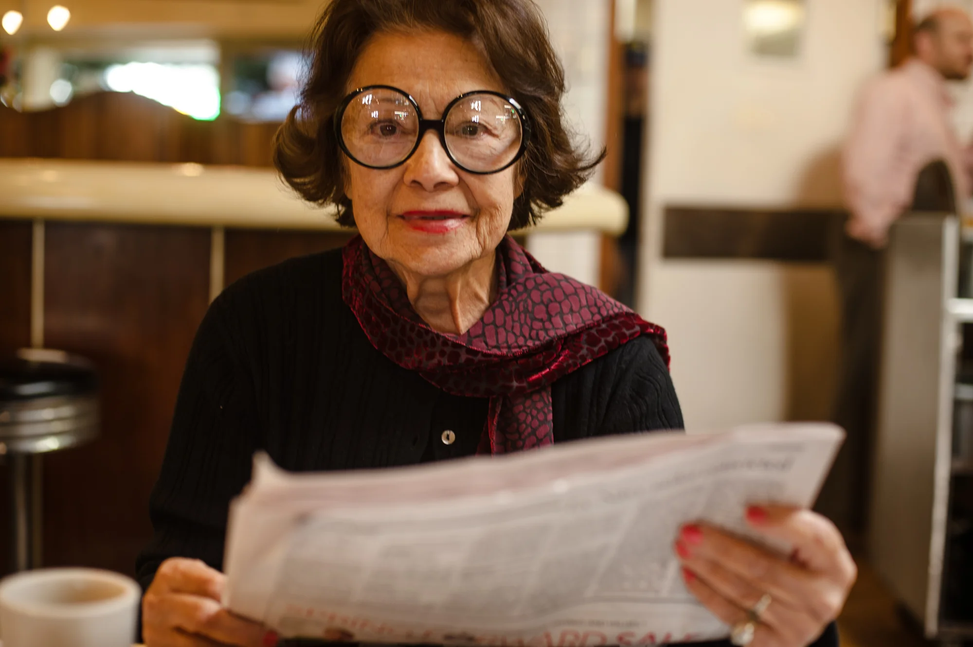 Bianca, age 82, sits in the cafe she visits daily in Los Angeles, 2008.