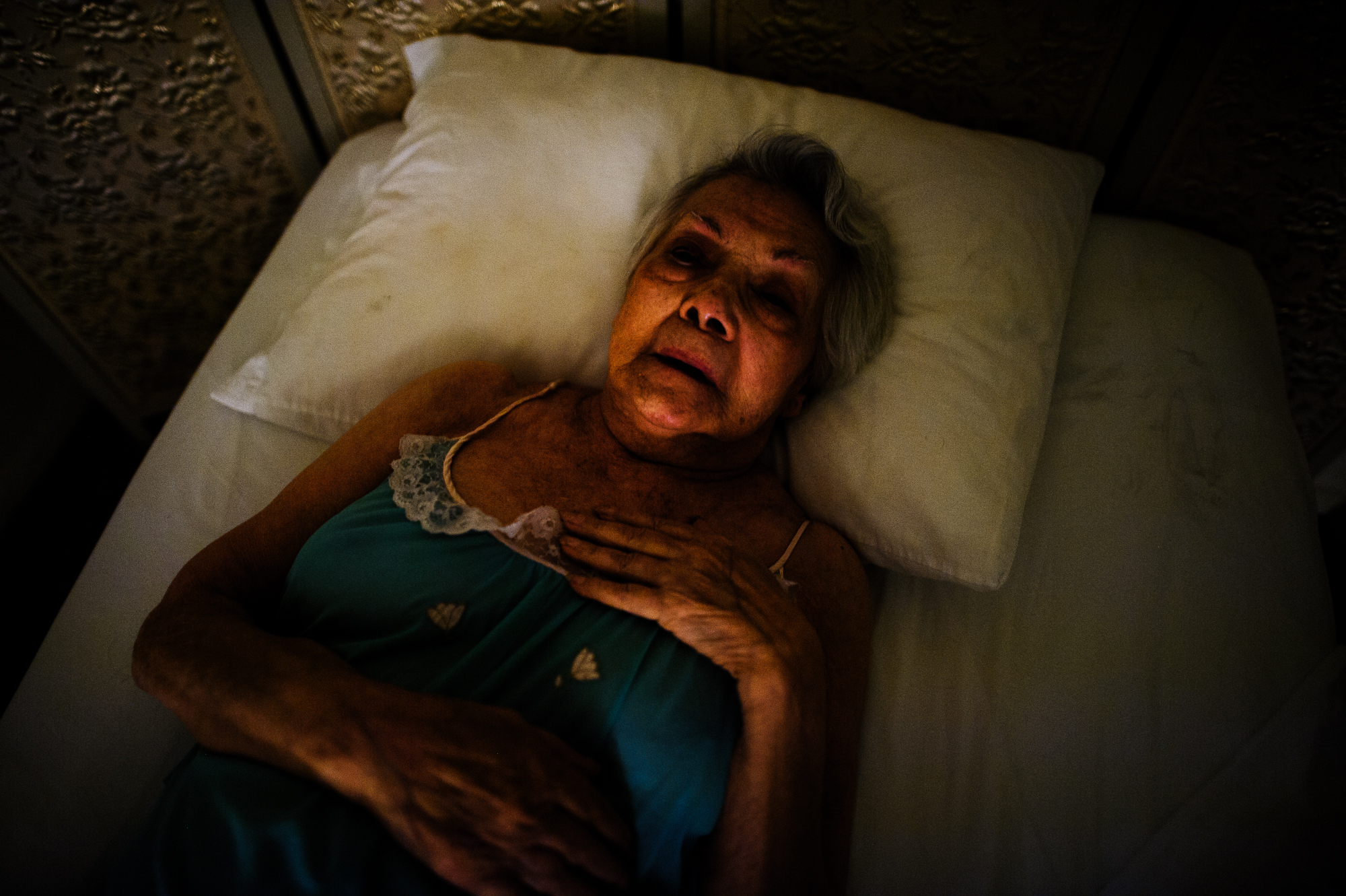  Bianca, age 87, lies on her bed, 2012.  