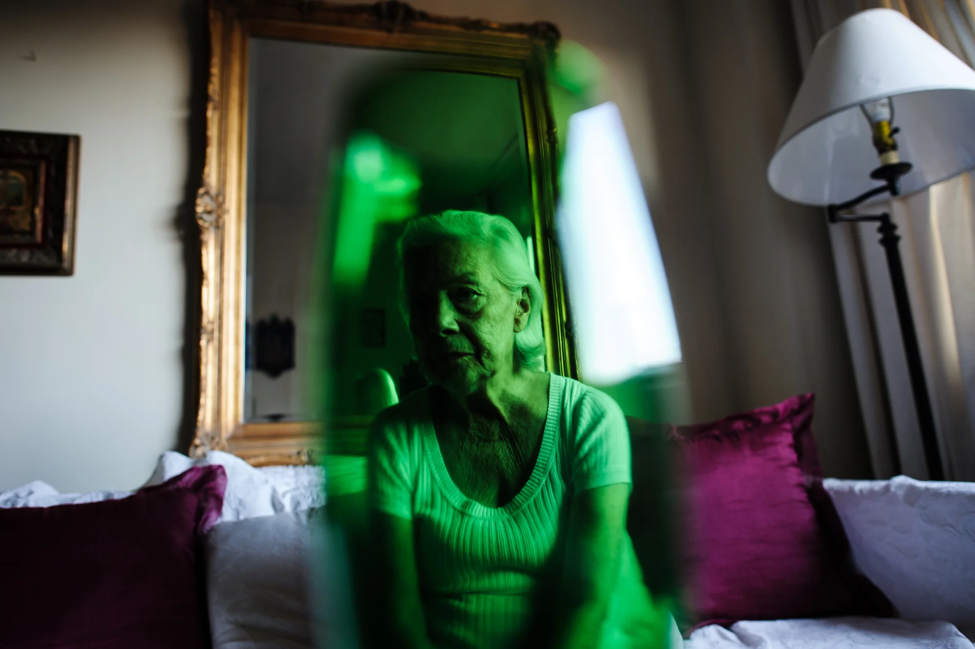 Bianca, age 85, sits on her couch, 2010.