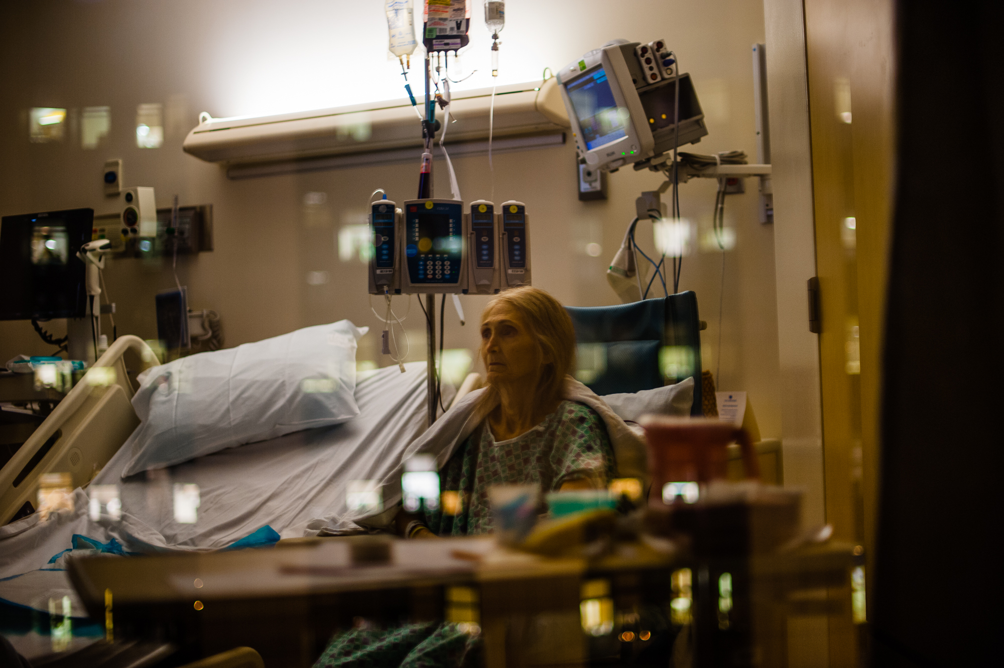  Rosie sits in a hospital room in Los Angeles at night.  