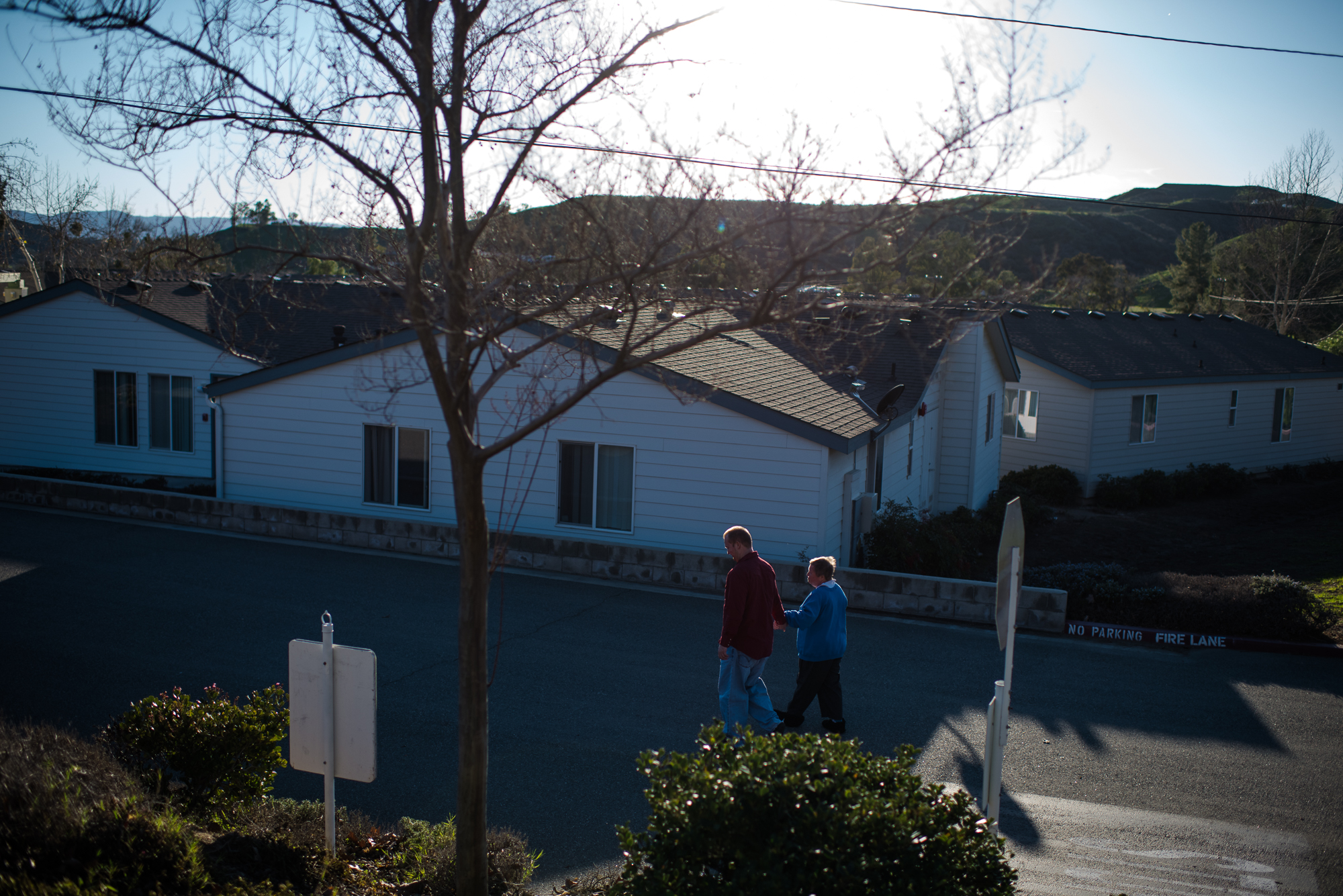 Nathaniel walks with his new girlfriend, Ruthie, around the property of the ranch where they live.