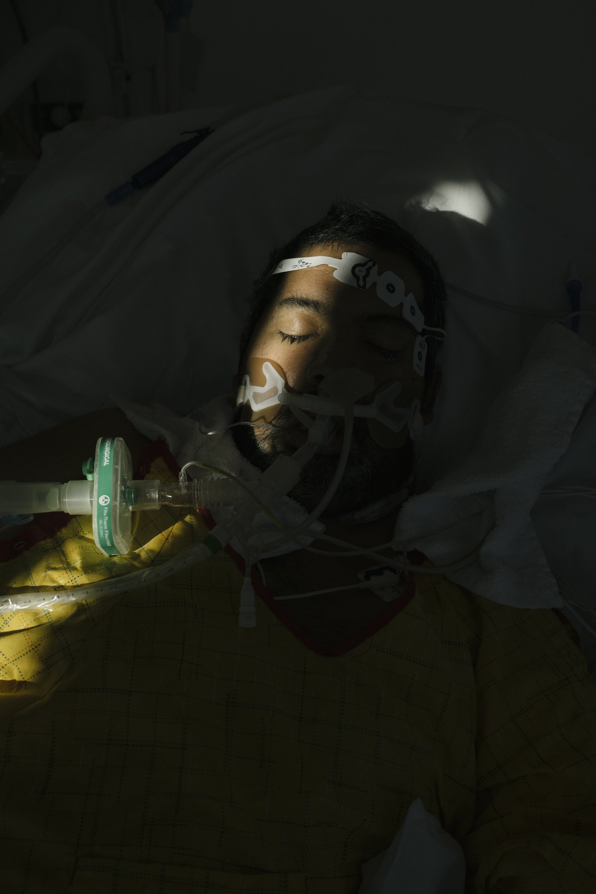  Gabriel Flores in his bed in the ICU. 