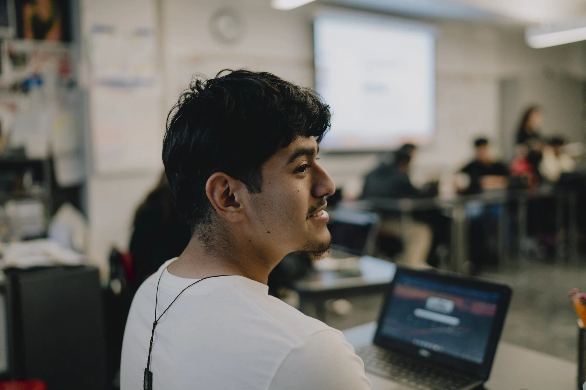  Javir sits during an Economics class at UCLA Community School. Javir is headed to the University of California Berkeley, where he received a full scholarship to study civil engineering. On this day, Javir participates in a discussion about student l