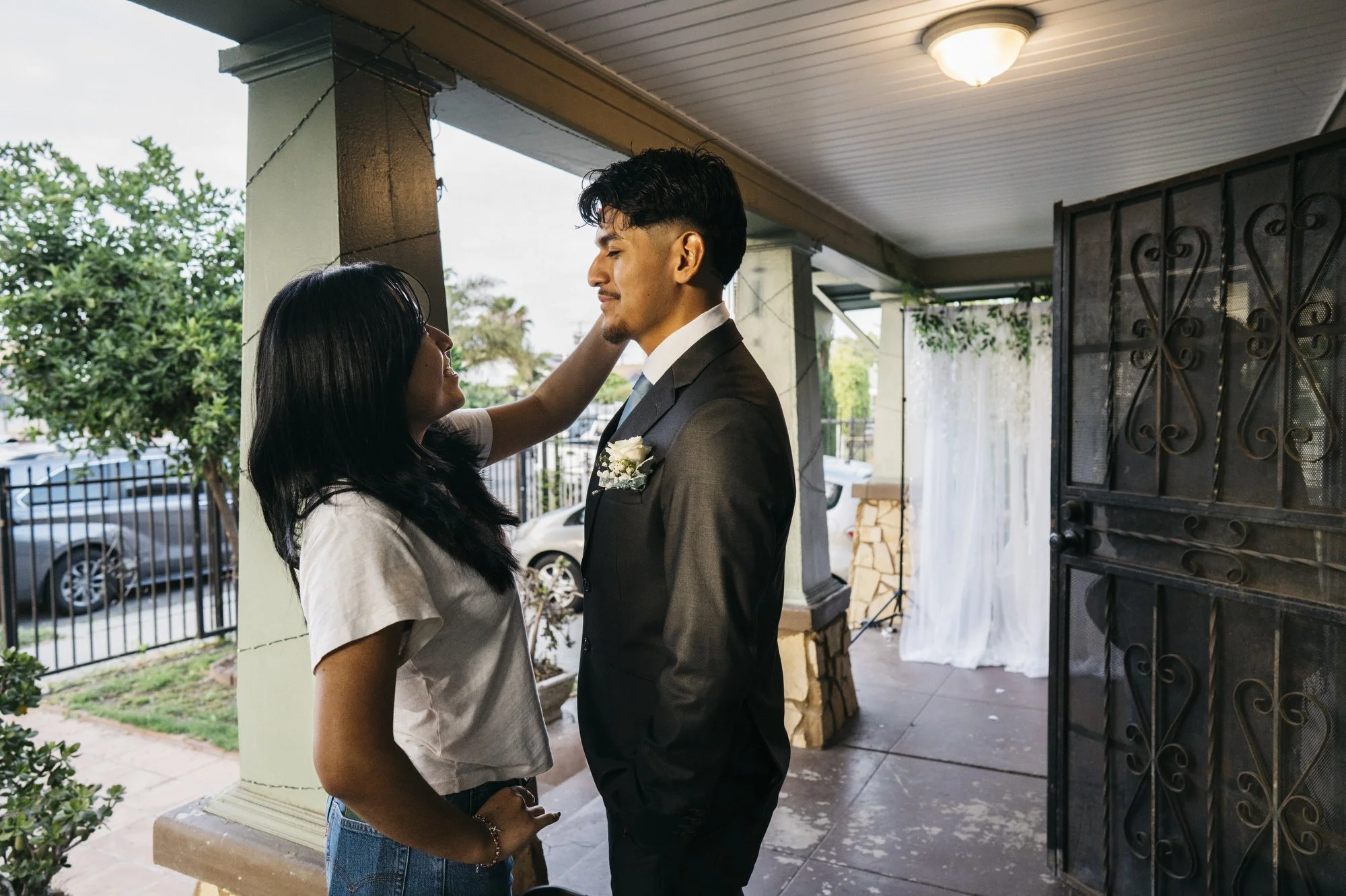  Javir stands with his sister before picking up Adila for Senior Prom in Los Angeles, California. 