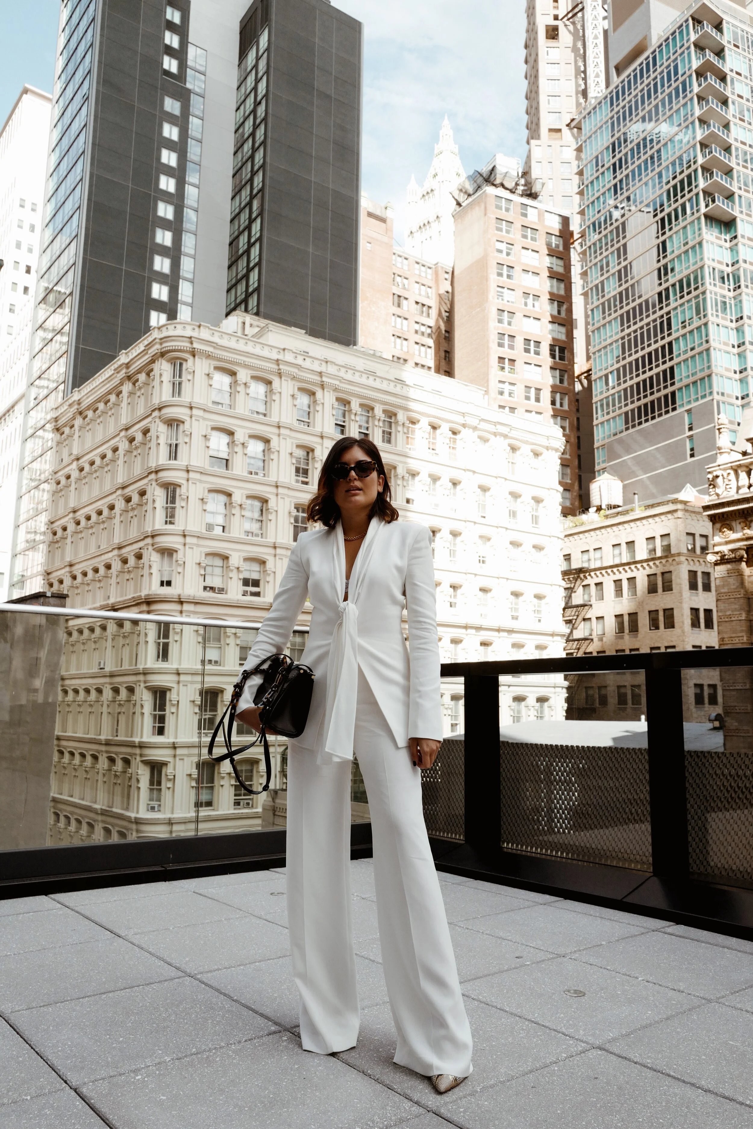 All White Suit by Emily Luciano