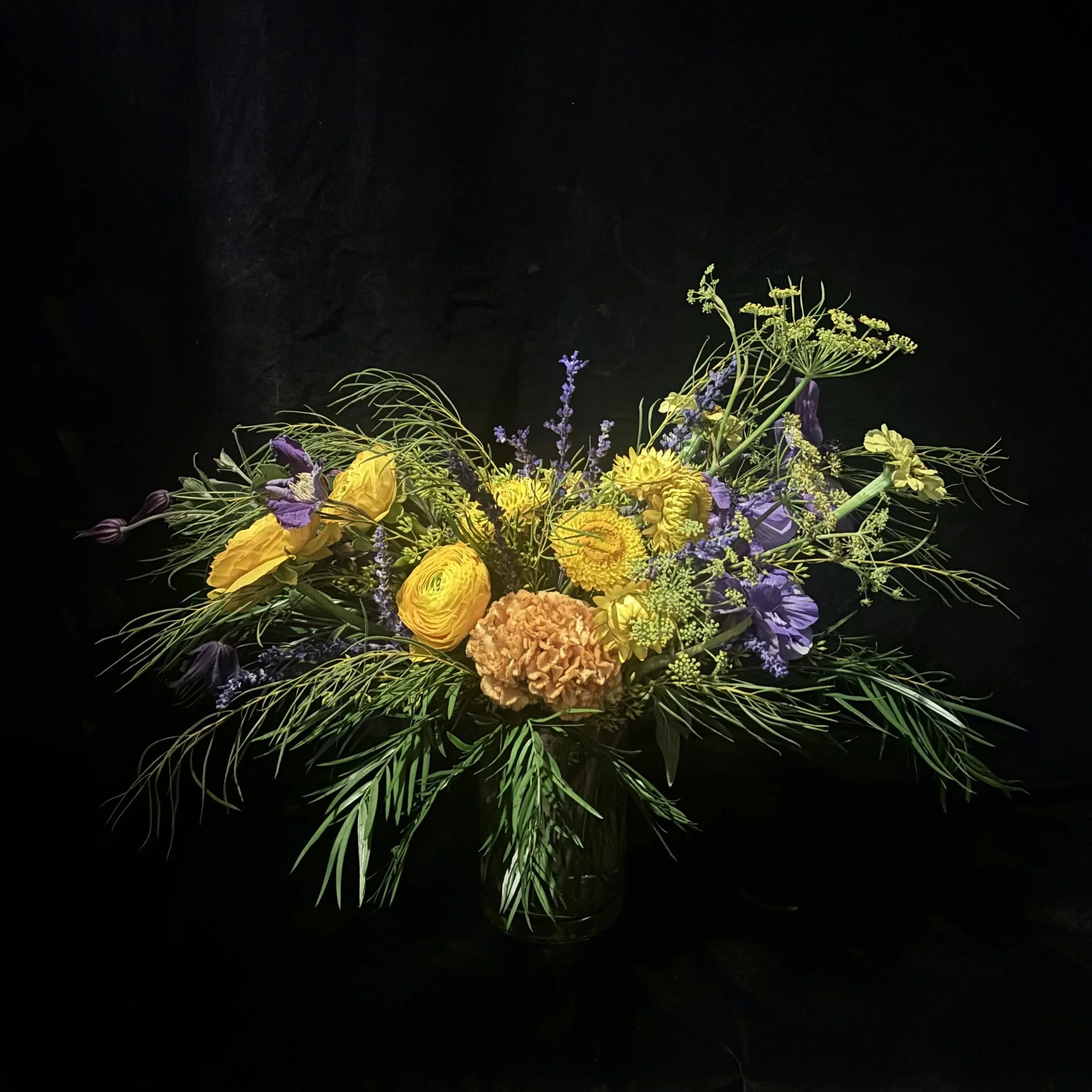 A medium Chanukah floral arrangement in yellow by fleursBELLA