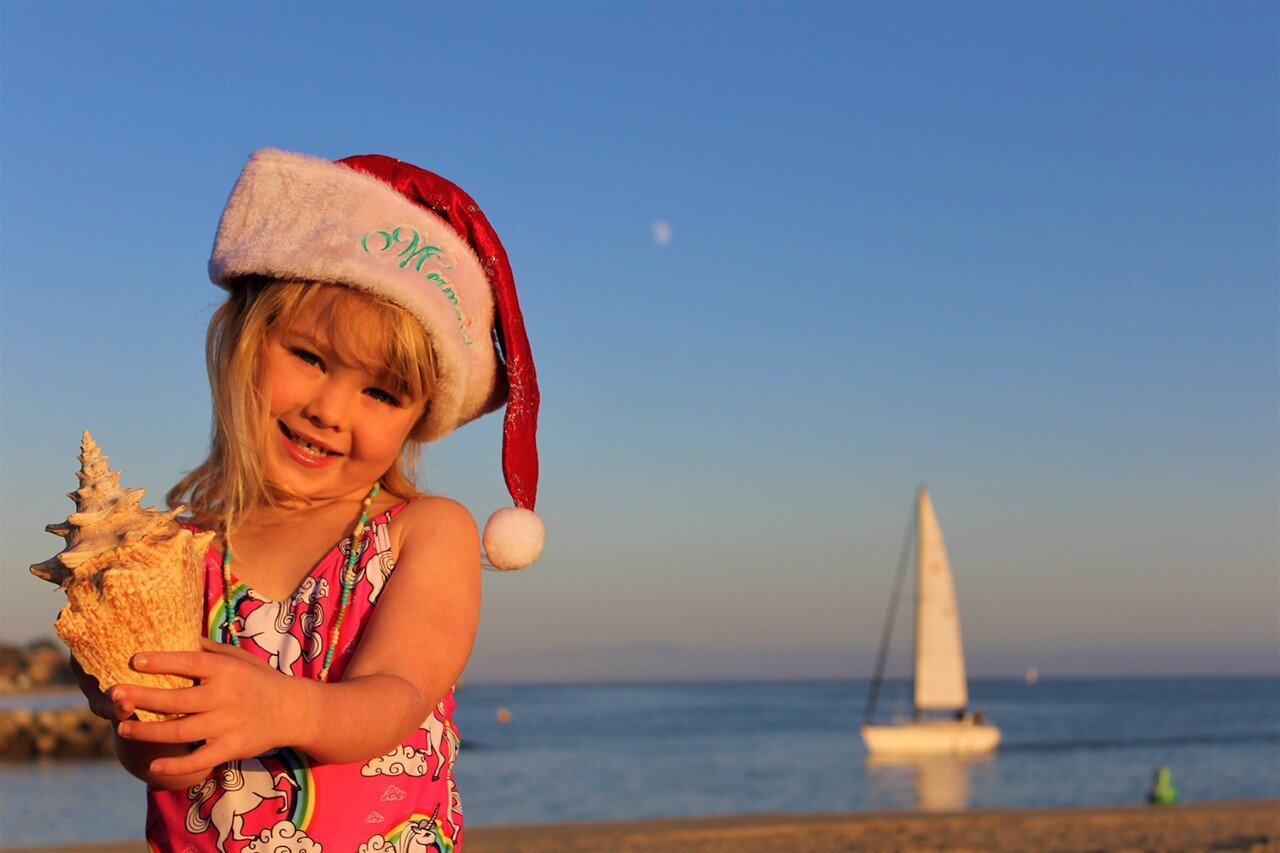 Mermaid in Santa Hat in Santa Cruz on the beach (Copy)