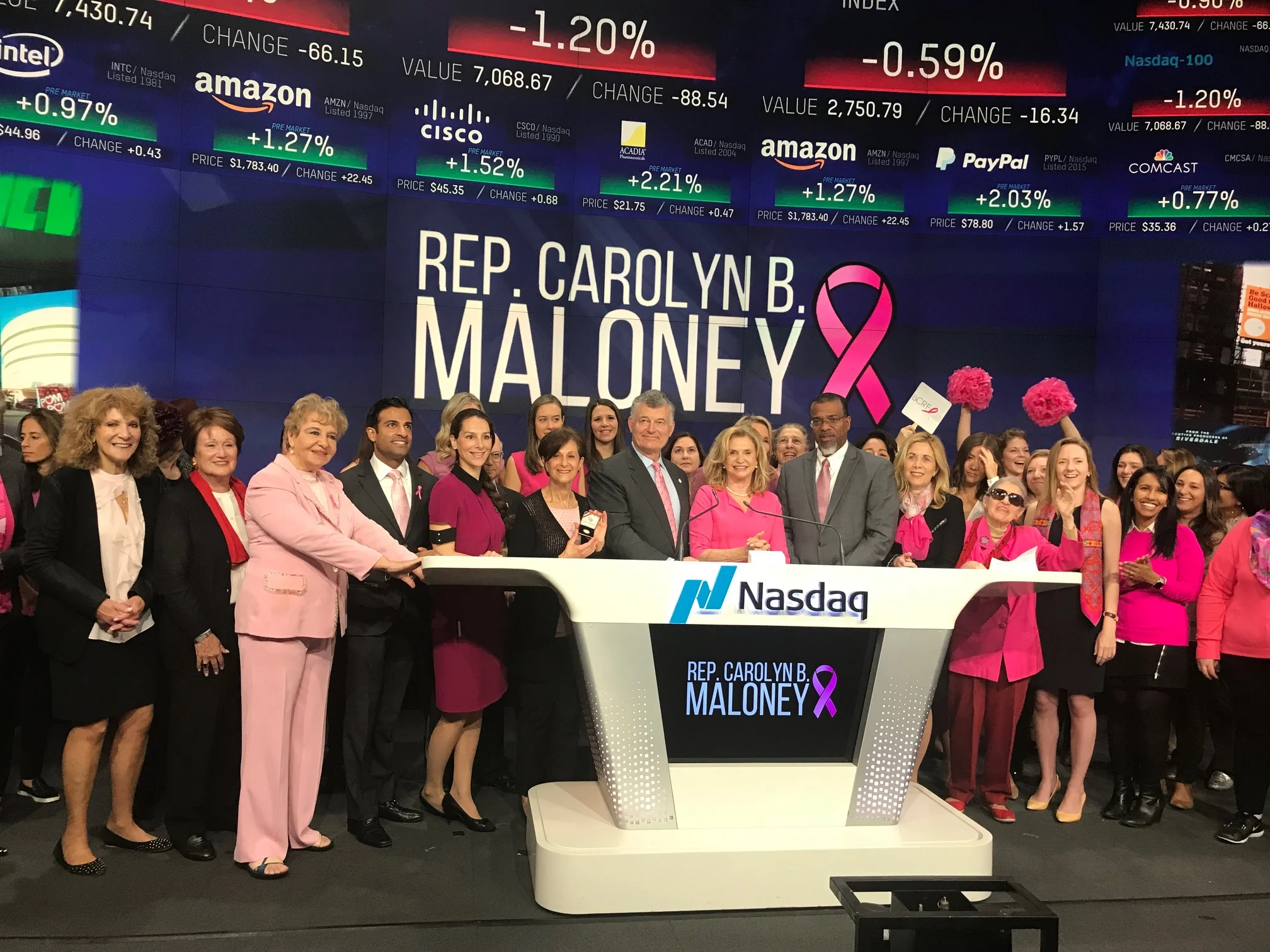 Caption: Carolyn B. Maloney rang the opening bell at NASDAQ to bring awareness to and help support breast cancer research.