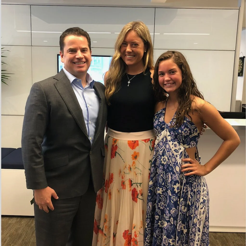 Matthew Higgins poses with two of Keith Young’s children, Kaley and Keira. Photo courtesy of Matthew Higgins.