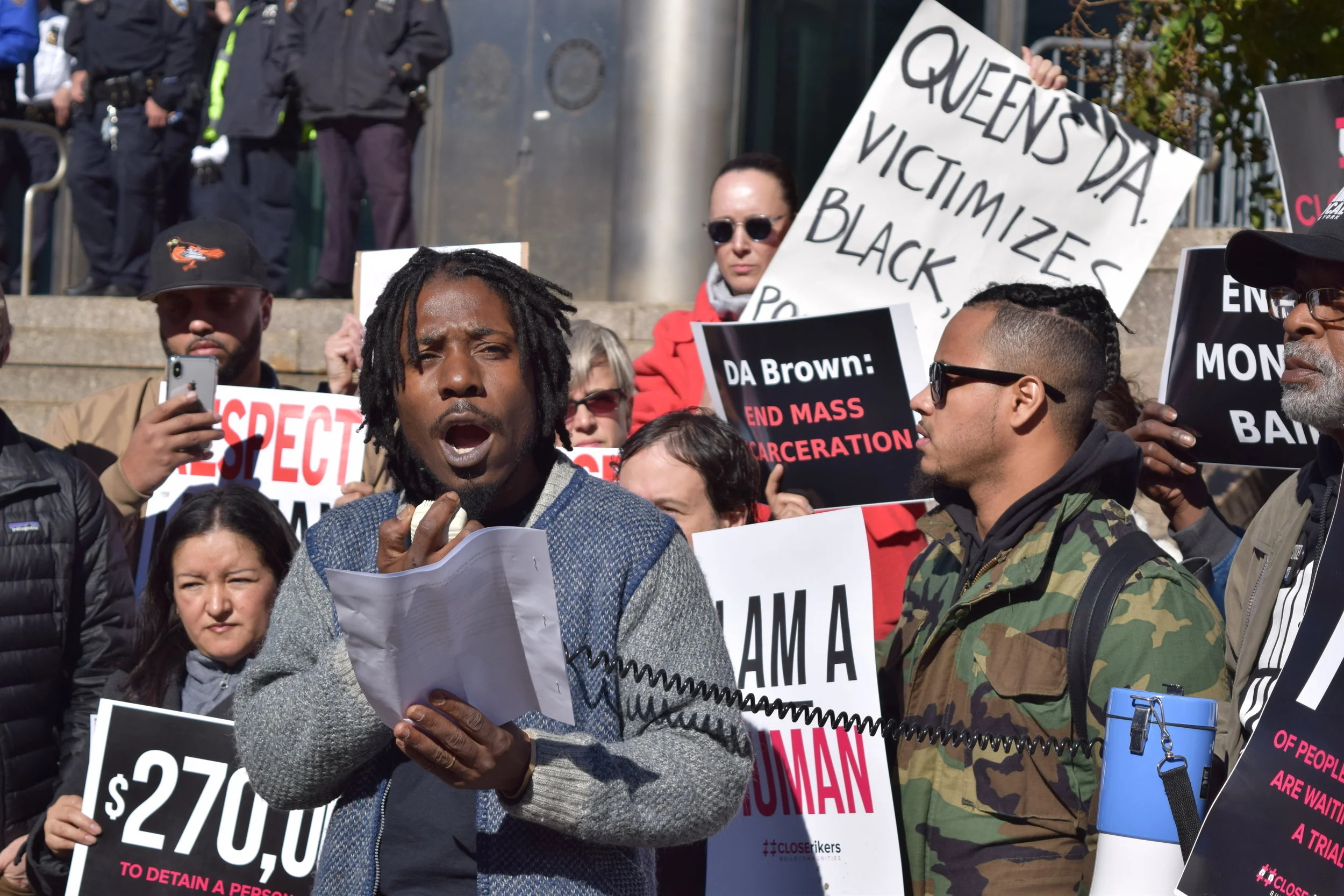 Demonstrators Demand Changes in Queens DA Office