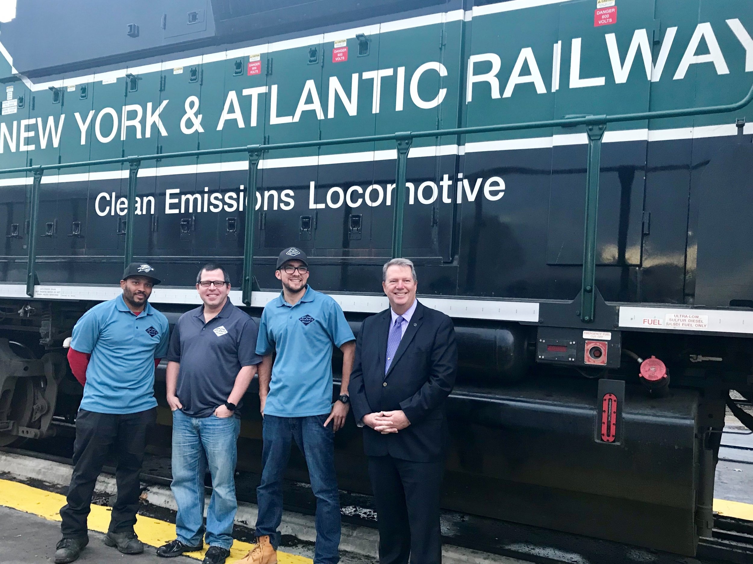Rommel Primus (left) used his belt as a tourniquet, William Bagley (second to left) stopped the train, Connor Ray (second from right) moved woman off of tracks and Christopher Smith (right) executive director of the Alzheimer’s Association, New York City Chapter. Photo courtesy of Alzheimer’s Association.