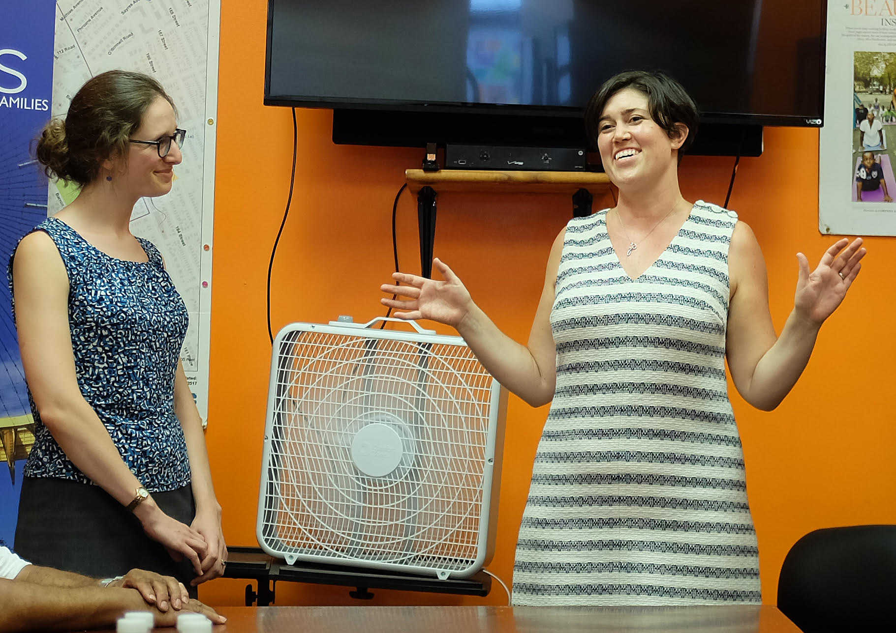 Legal Aid attorney Emma Goodman (right) has organized Case Closed workshops around Queens. In this August file photo, Goodman and Legal Aid attorney Melissa Ader discuss conviction-sealing at an event sponsored by Borough President Melinda Katz. Eagle file photo by Andy Katz.