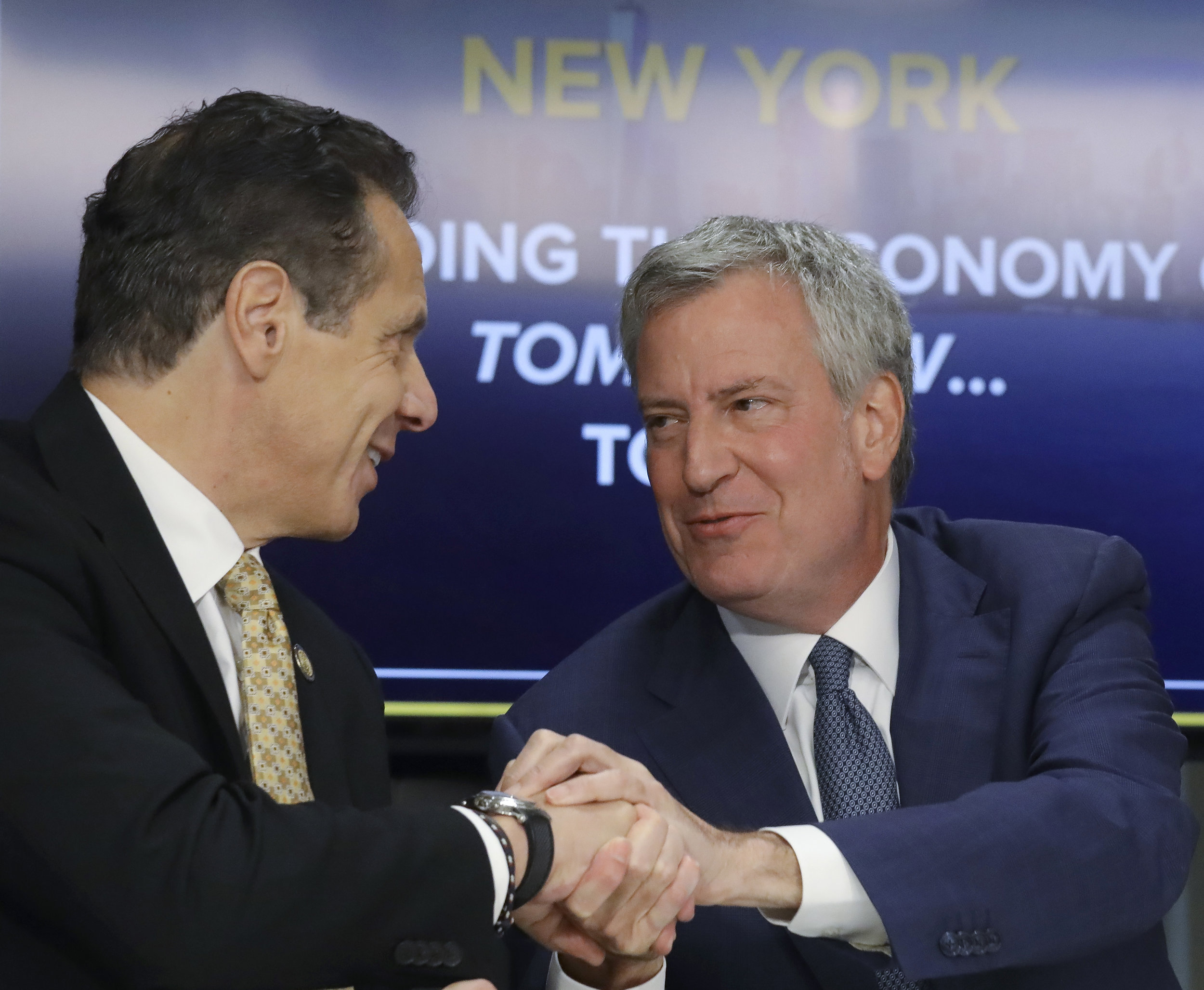 Gov. Andrew Cuomo and Mayor Bill de Blasio both embraced Amazon’s arrival at a press conference this week. AP Photo.