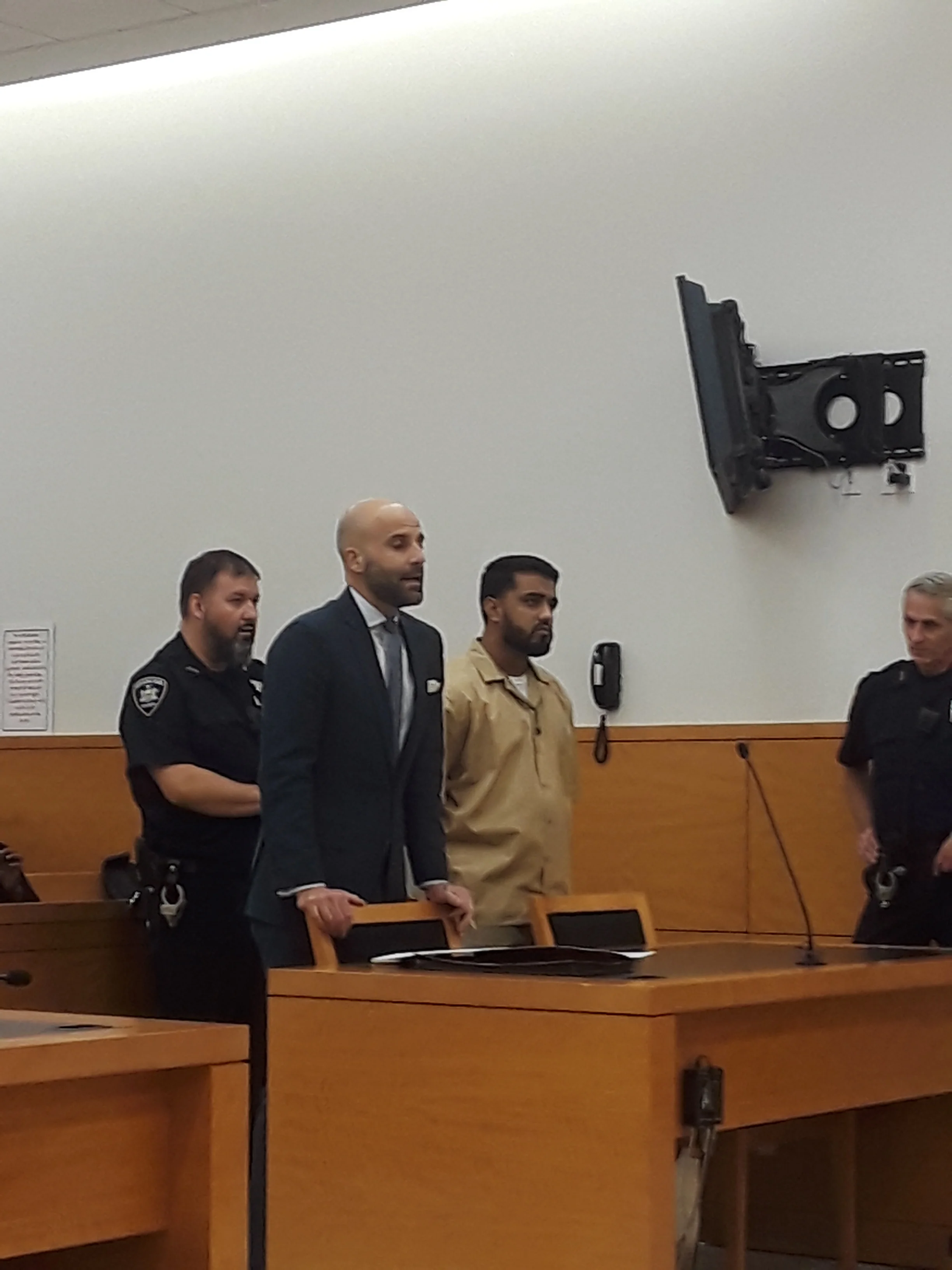 Saeed Ahmad (right) in Brooklyn Supreme Court on Tuesday, Nov. 27, 2018 standing next to his attorney Michael Jaccarino (left) before pleading guilty to causing the death of Harleen Grewall on Oct. 13, 2017. Eagle photo(s) by Christina Carrega.