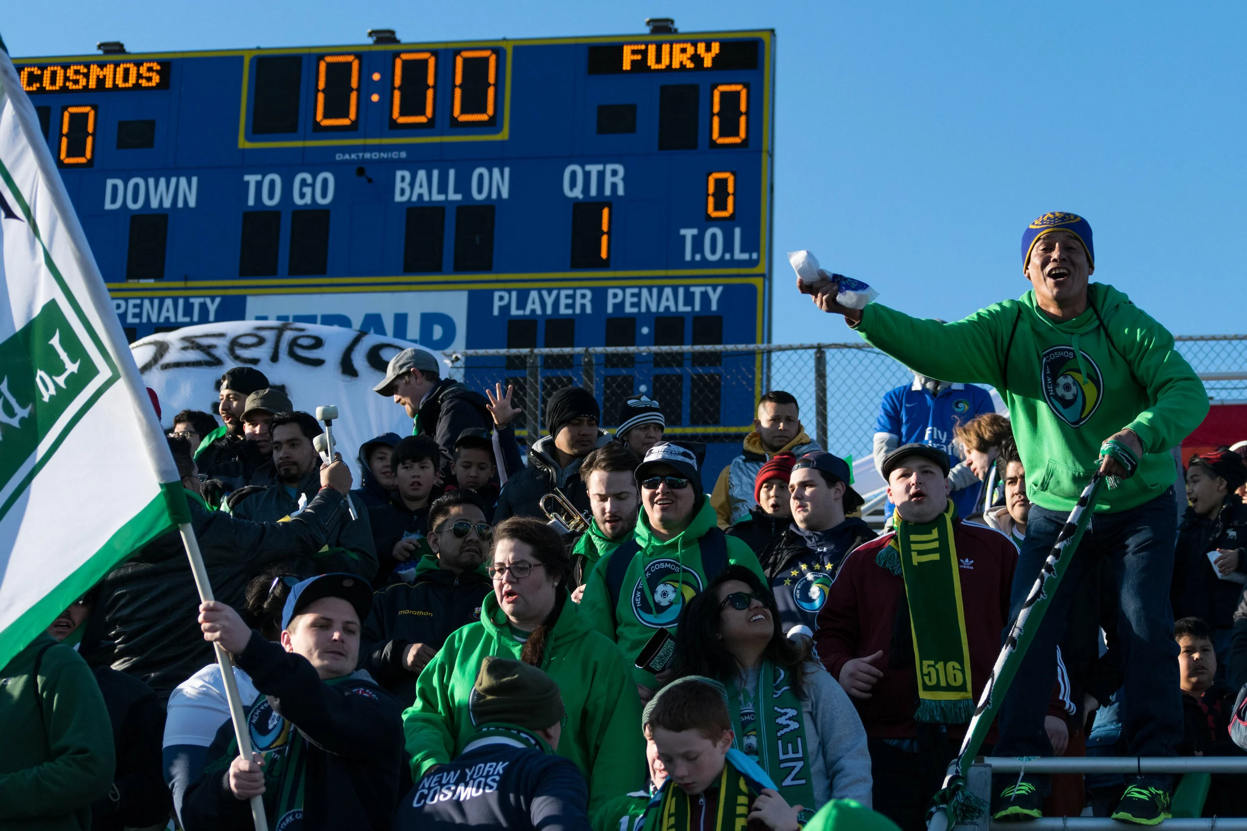 Cosmos support cheer on their club at their old home field at Hofstra University. // Photo by Steve Hamlin
