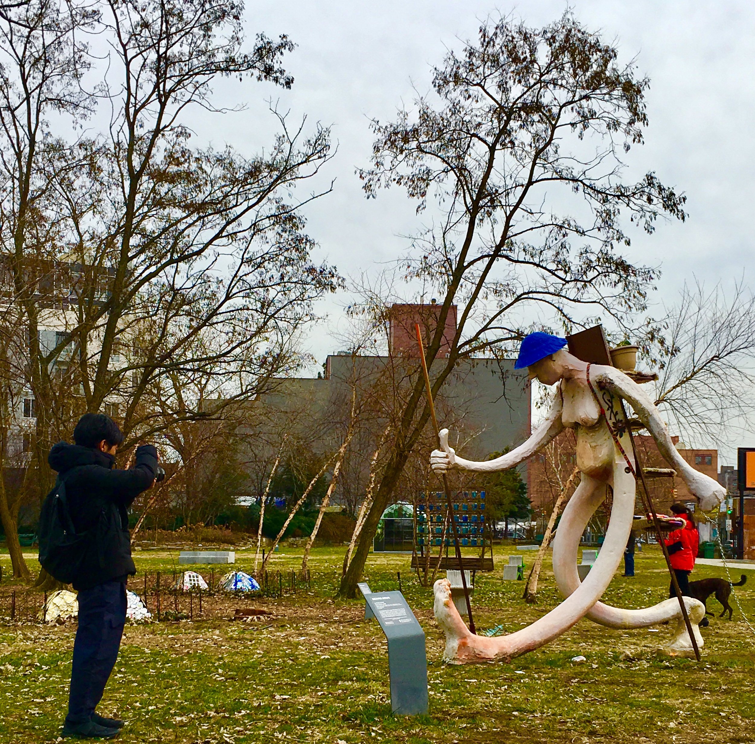  Socrates Sculpture Park visitors get a close look at “Free Peddler” by Brooklyn-based artist Antone Konst.  