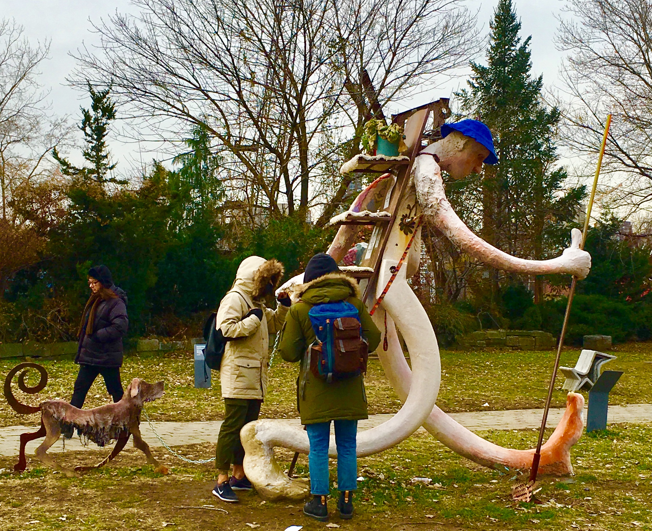 Socrates Sculpture Park visitors get a close look at “Free Peddler” by Brooklyn-based artist Antone Konst. 