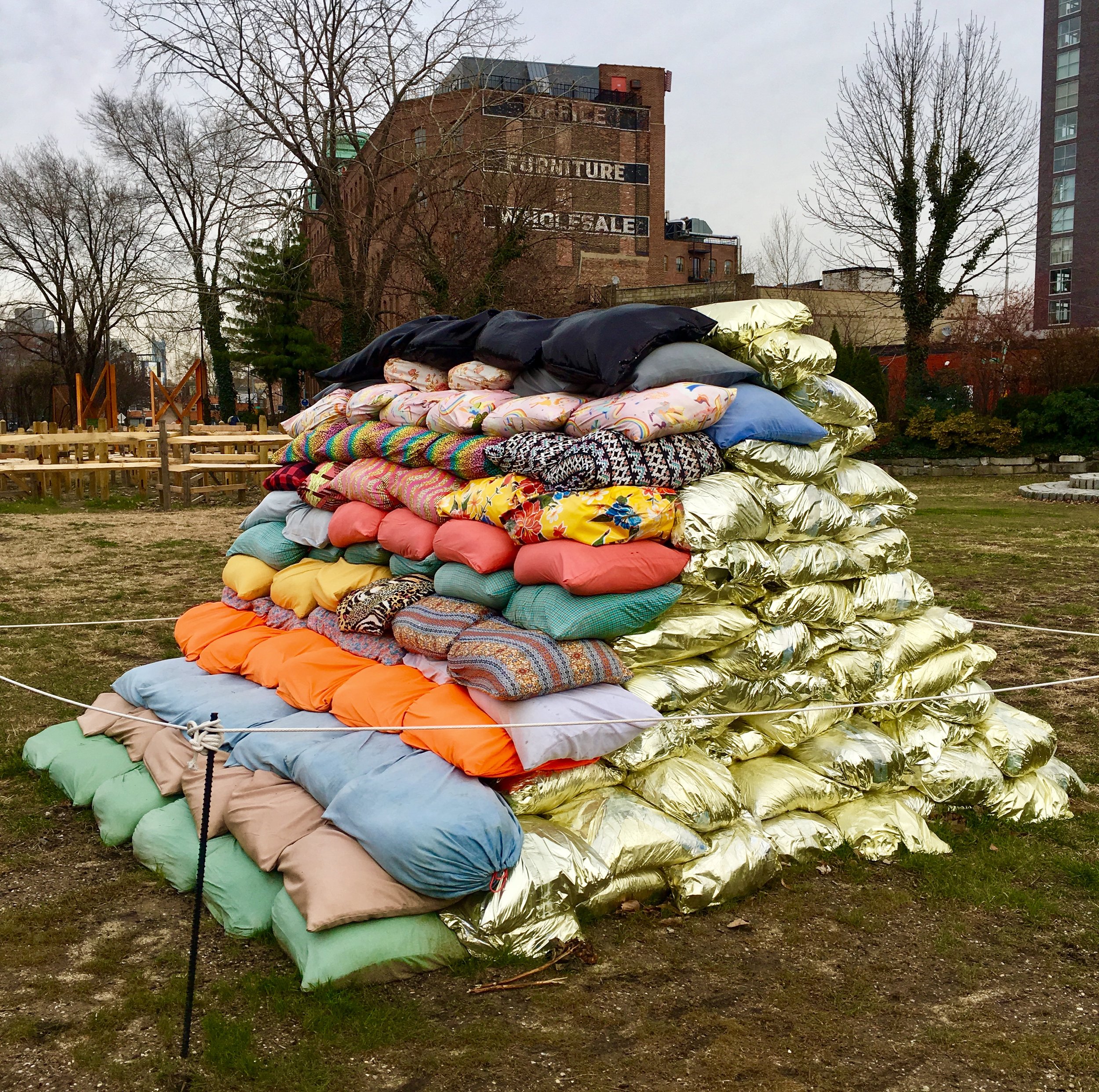  This enigmatic stack of sandbags is an artwork by Nancy Nowacek called “Maneuver” that&amp;#39;s being exhibited at Socrates Sculpture Park. 