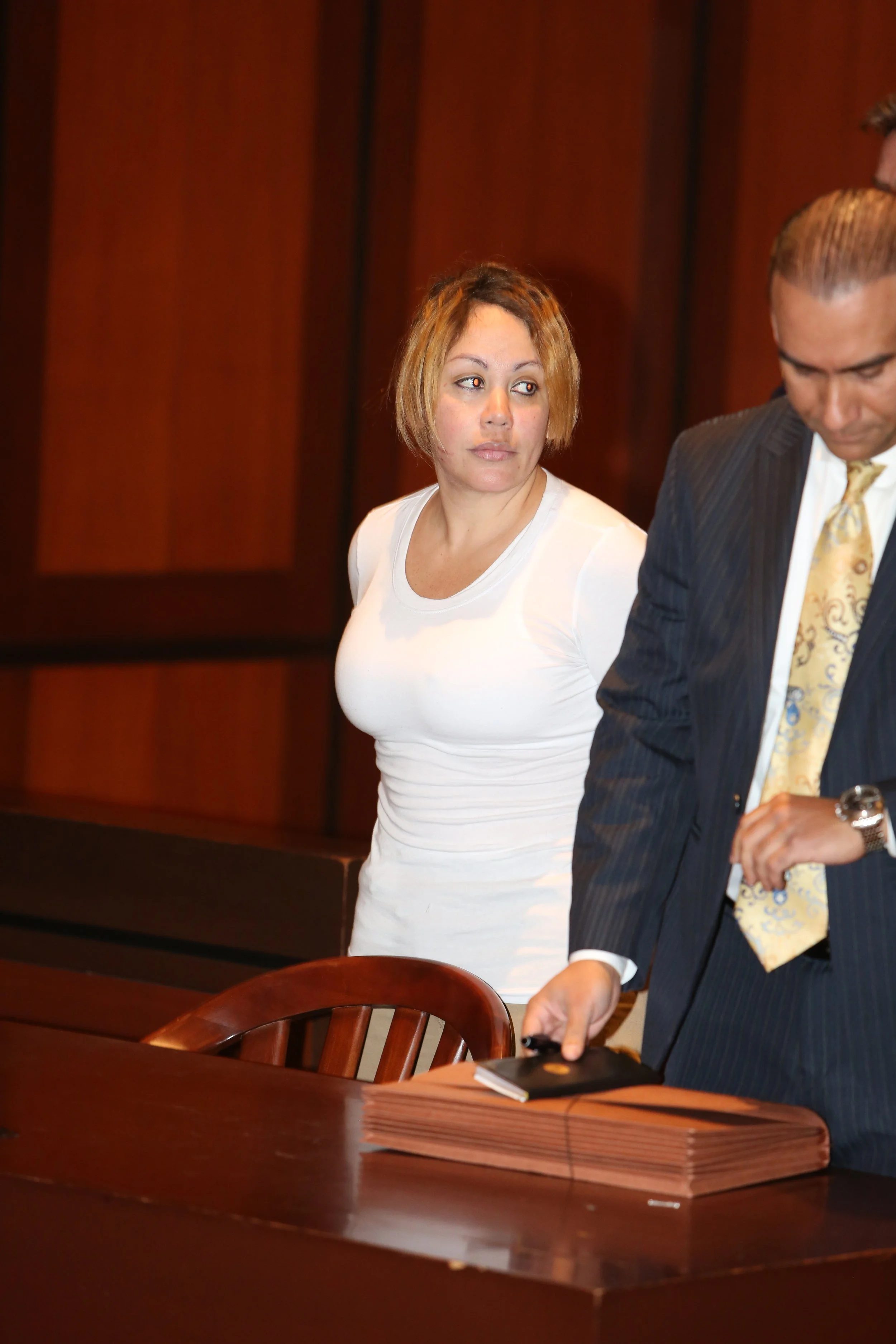 Arelis Peralta is accused of running the organization with her husband, Ludwig Paz. Pool photo by Ellis Kaplan