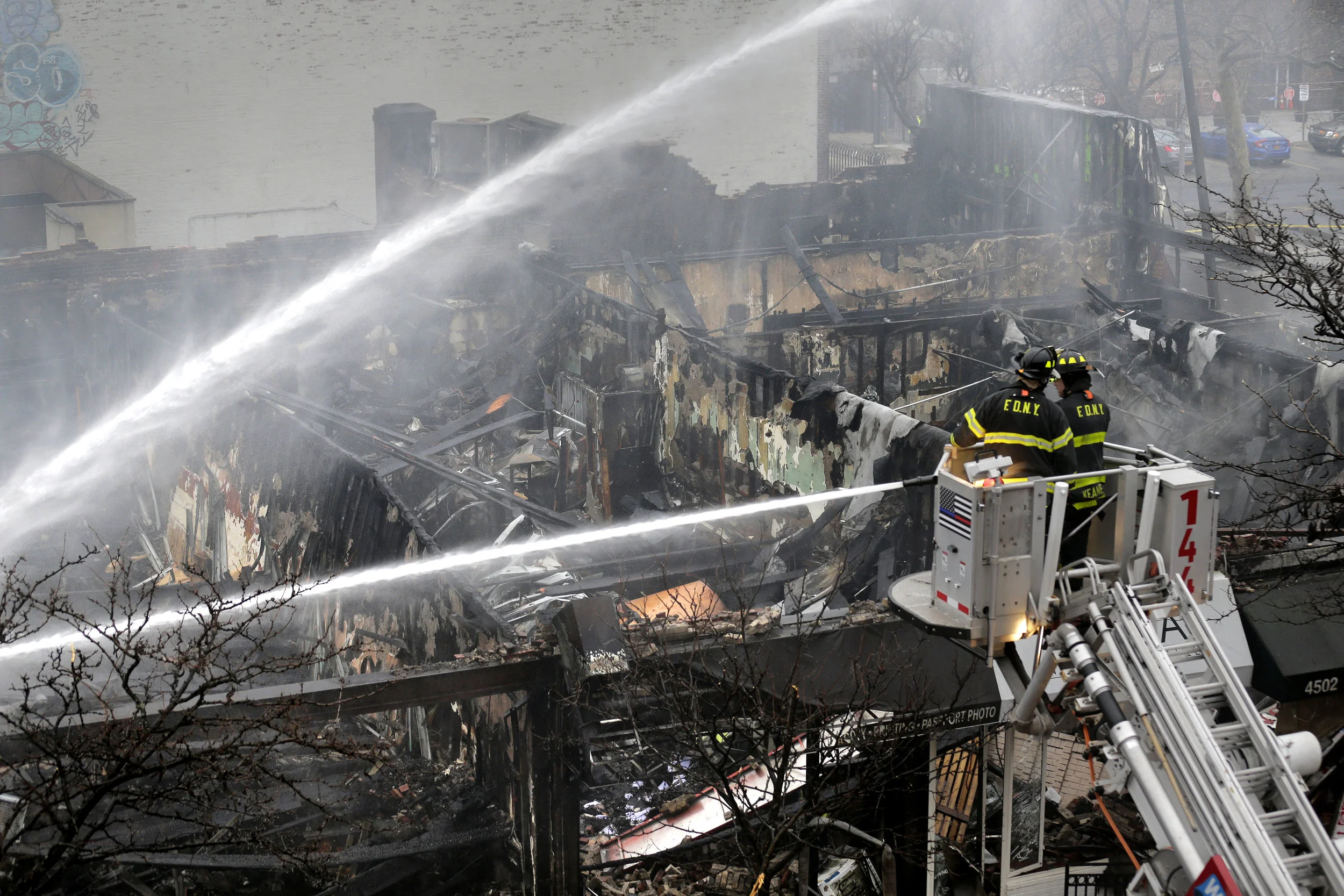 Twelve injured as fire spreads through Sunnyside stores