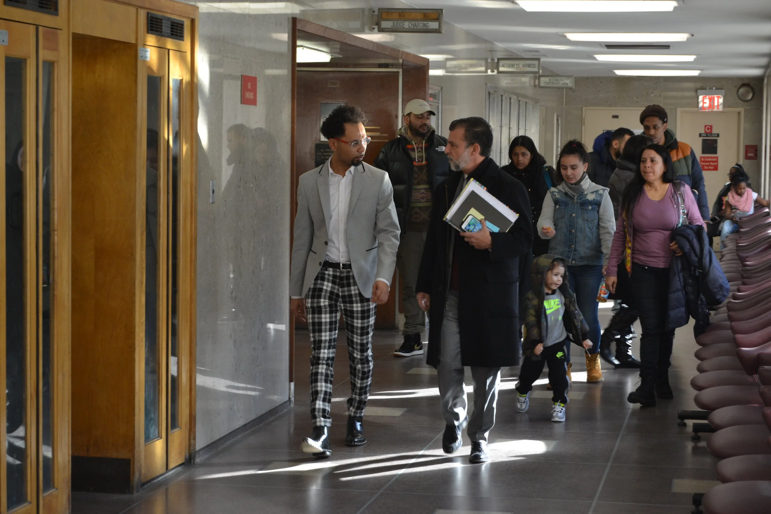 Rodney “Bucks” Charlemagne (left) with his defense attorney James Kousouros (right) in Queens Supreme Court on Tuesday, Dec. 4. Eagle photo by Christina Carrega