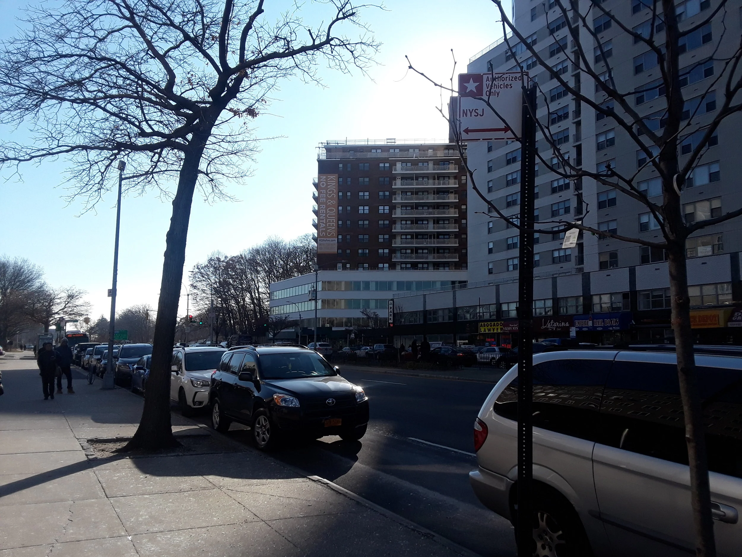 Cars parked in NYP Parking Zones in front of 125-01 Queens Blvd. on Dec. 11. Eagle photos by Christina Carrega.