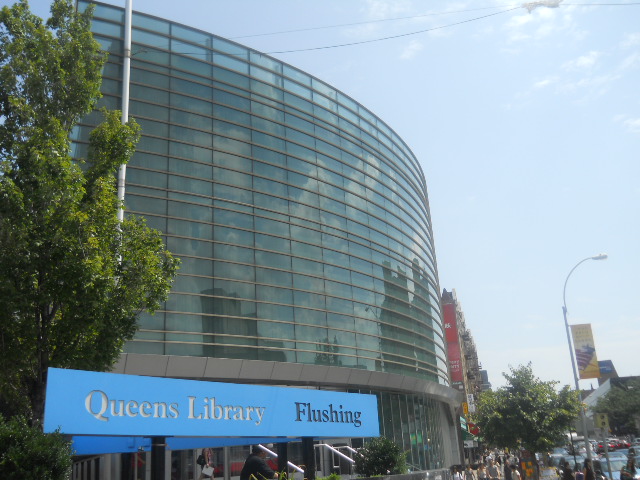 The Queens Library’s Flushing branch was supposed to host a three-week photo exhibition before administrators pulled it. Wikimedia photo by Youngking11.