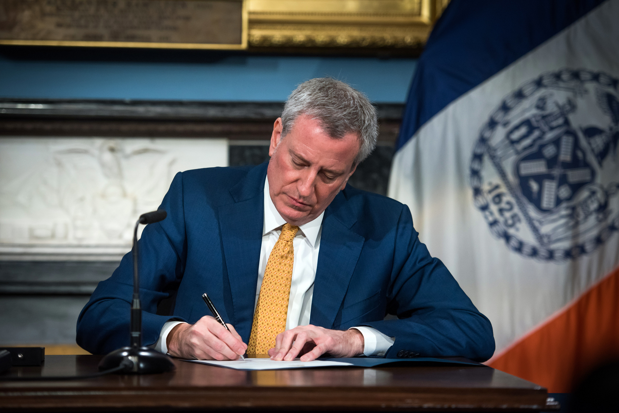 Mayor Bill de Blasio signs a campaign finance bill at City Hall on Jan. 2. At the same ceremony, he signed a proclamation declaring Feb. 26 as the date for the special election for public advocate. Photo via Flickr/NYCMayorsOffice
