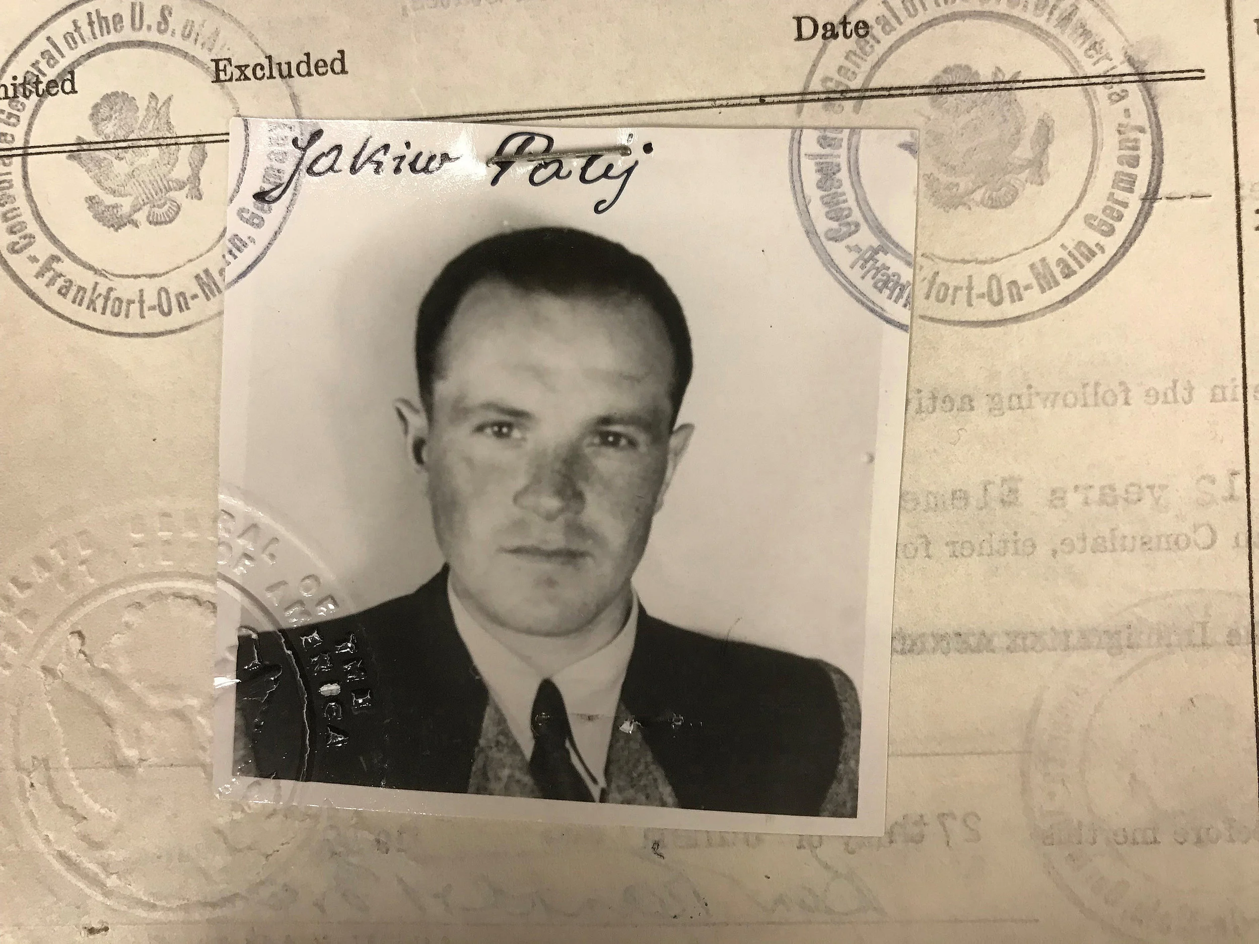 A 1949 visa photo provided by the U.S. Department of Justice shows Jakiw Palij, a former Nazi concentration camp guard who lived in Jackson Heights. Palij was extradited to Germany last year and German media report that he died Wednesday. US Department of Justice via AP, file